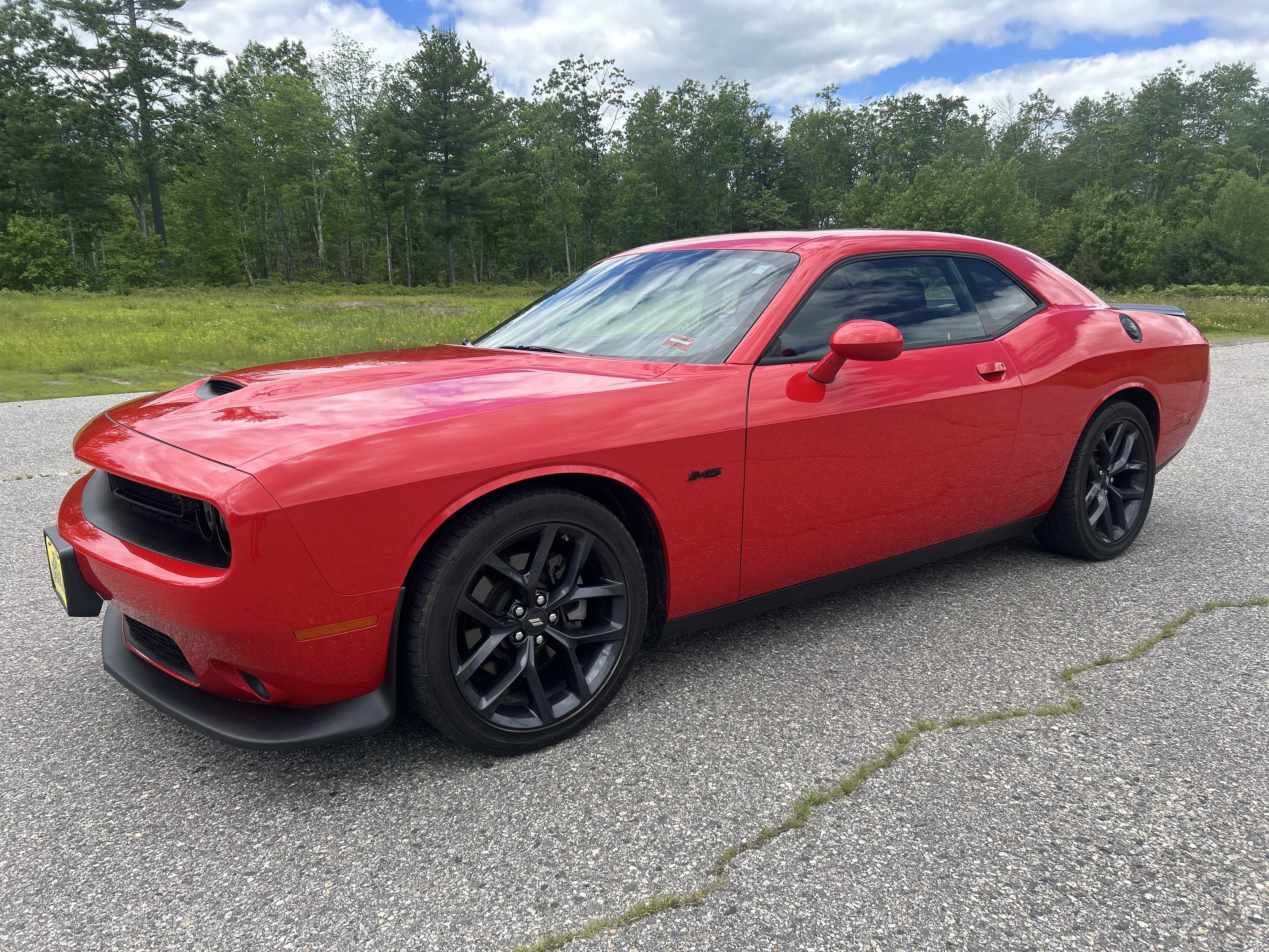 2023 Dodge Challenger R/T in Torred Clearcoat — front three-quarter view
