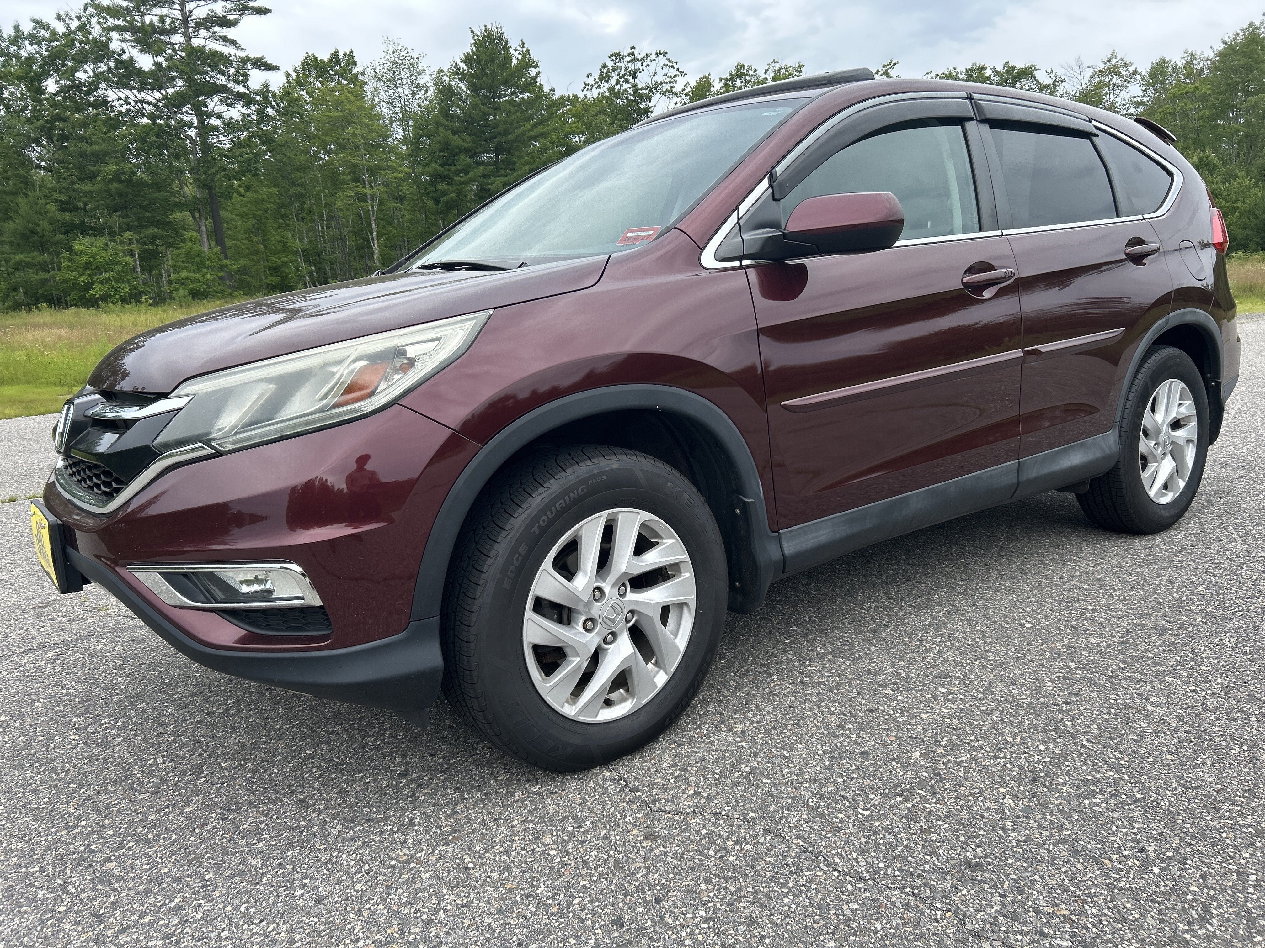 2015 Honda CR-V EX in Basque Red Pearl II — front three-quarter view