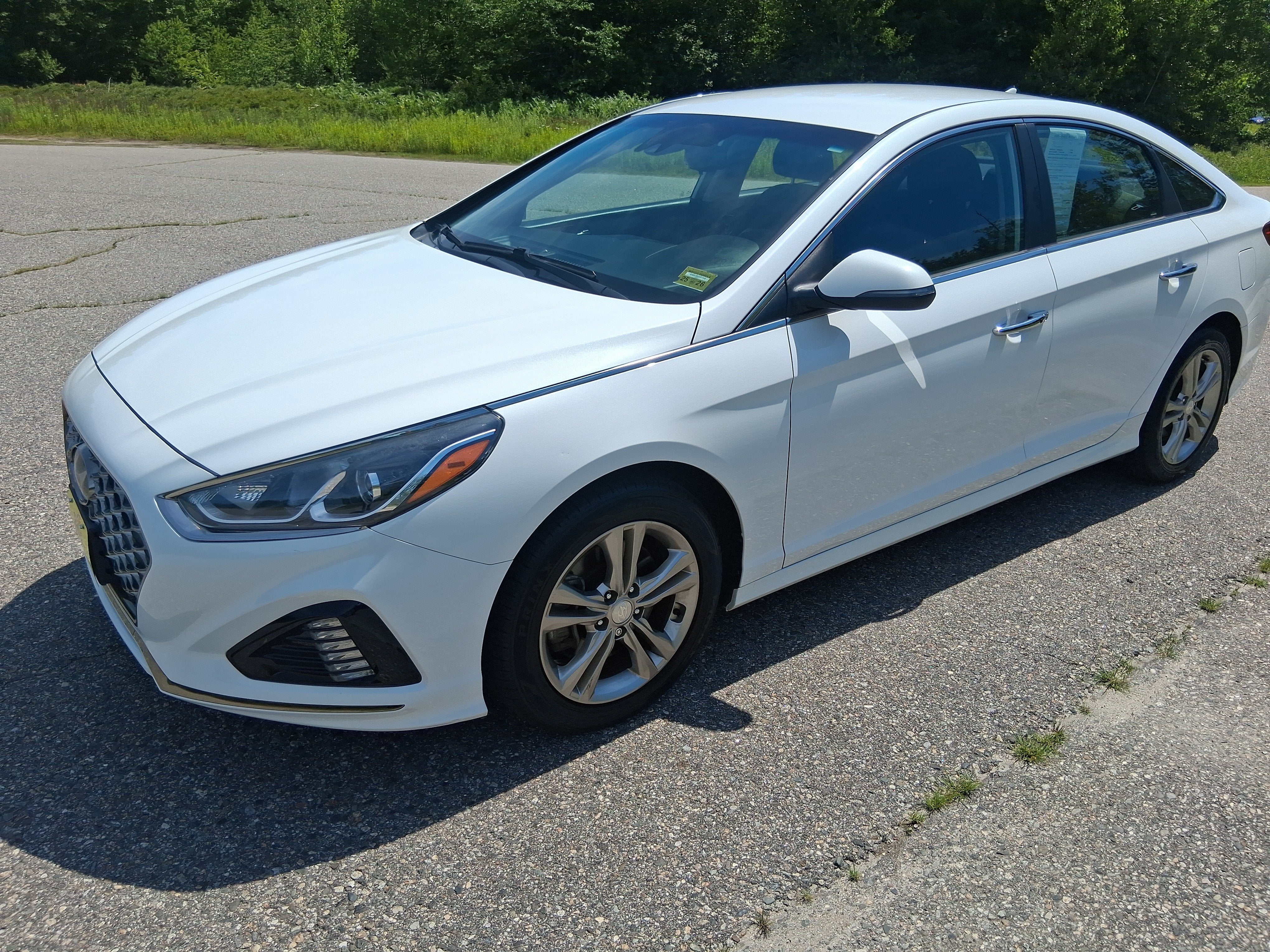 2019 Hyundai Sonata SEL in Quartz White Pearl — front three-quarter view