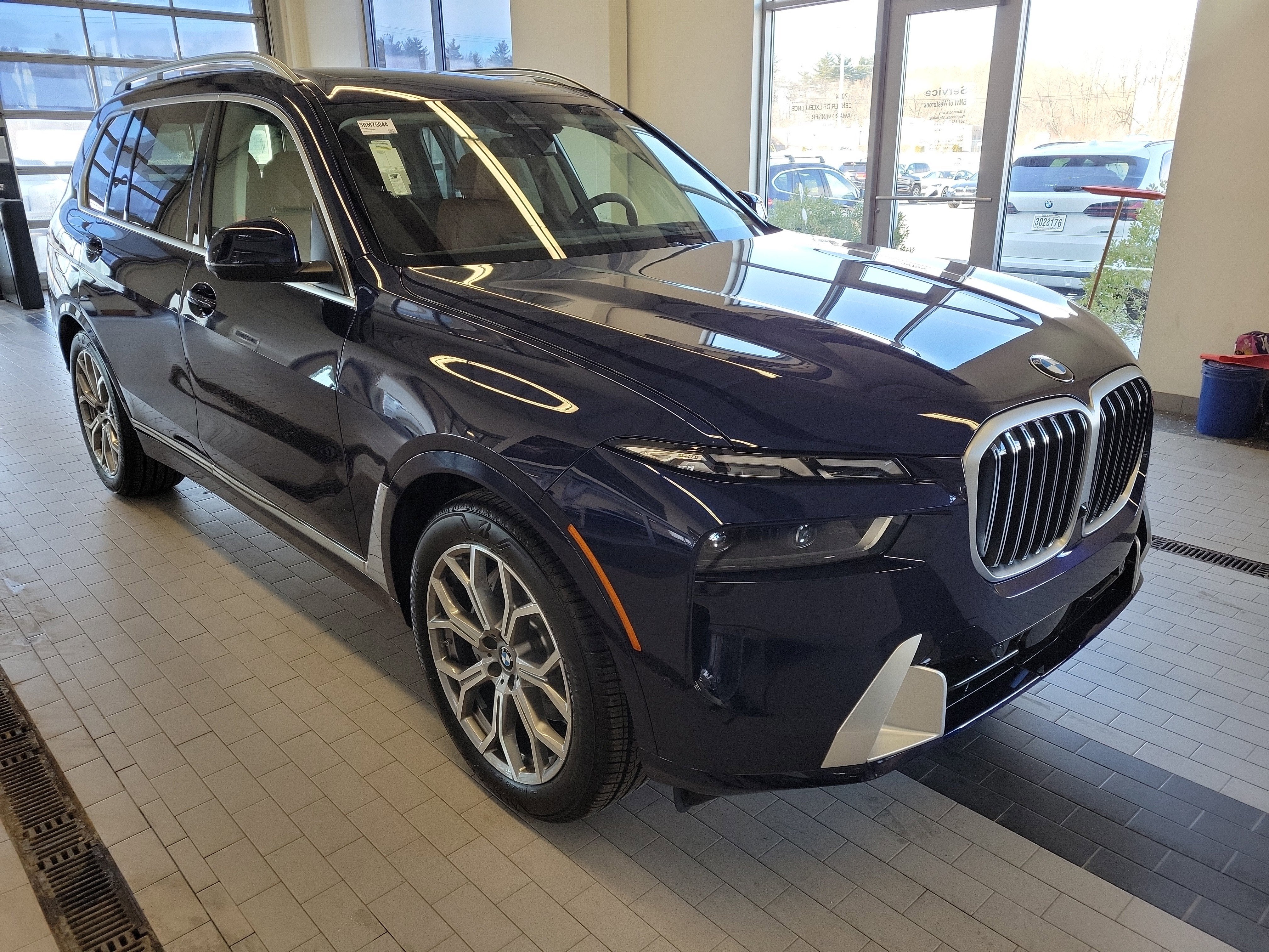 2026 BMW X7 — rear three-quarter view