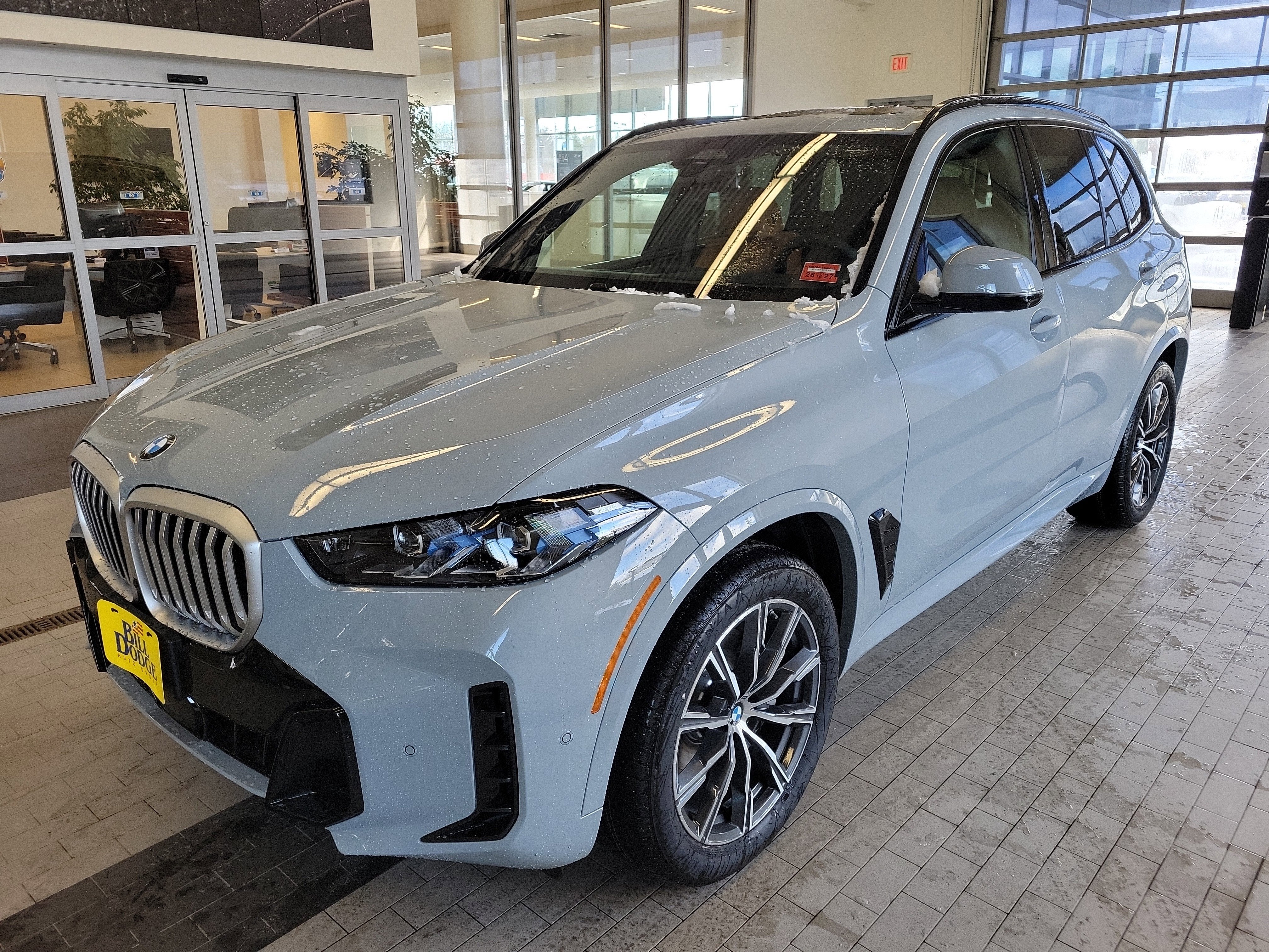 2026 BMW X5 xDrive40i in Brooklyn Grey Metallic — front three-quarter view