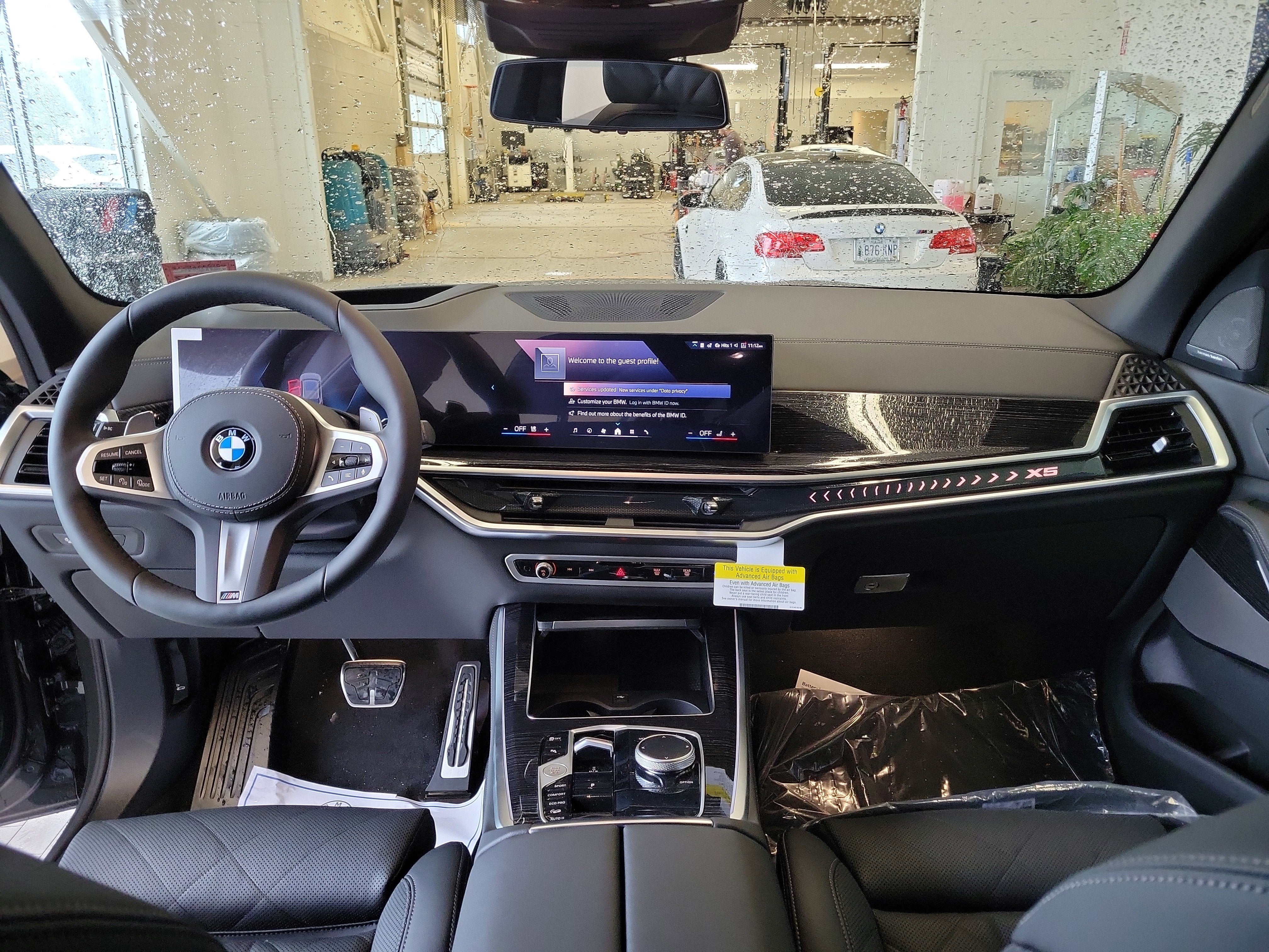 2026 BMW X5 — rear three-quarter view