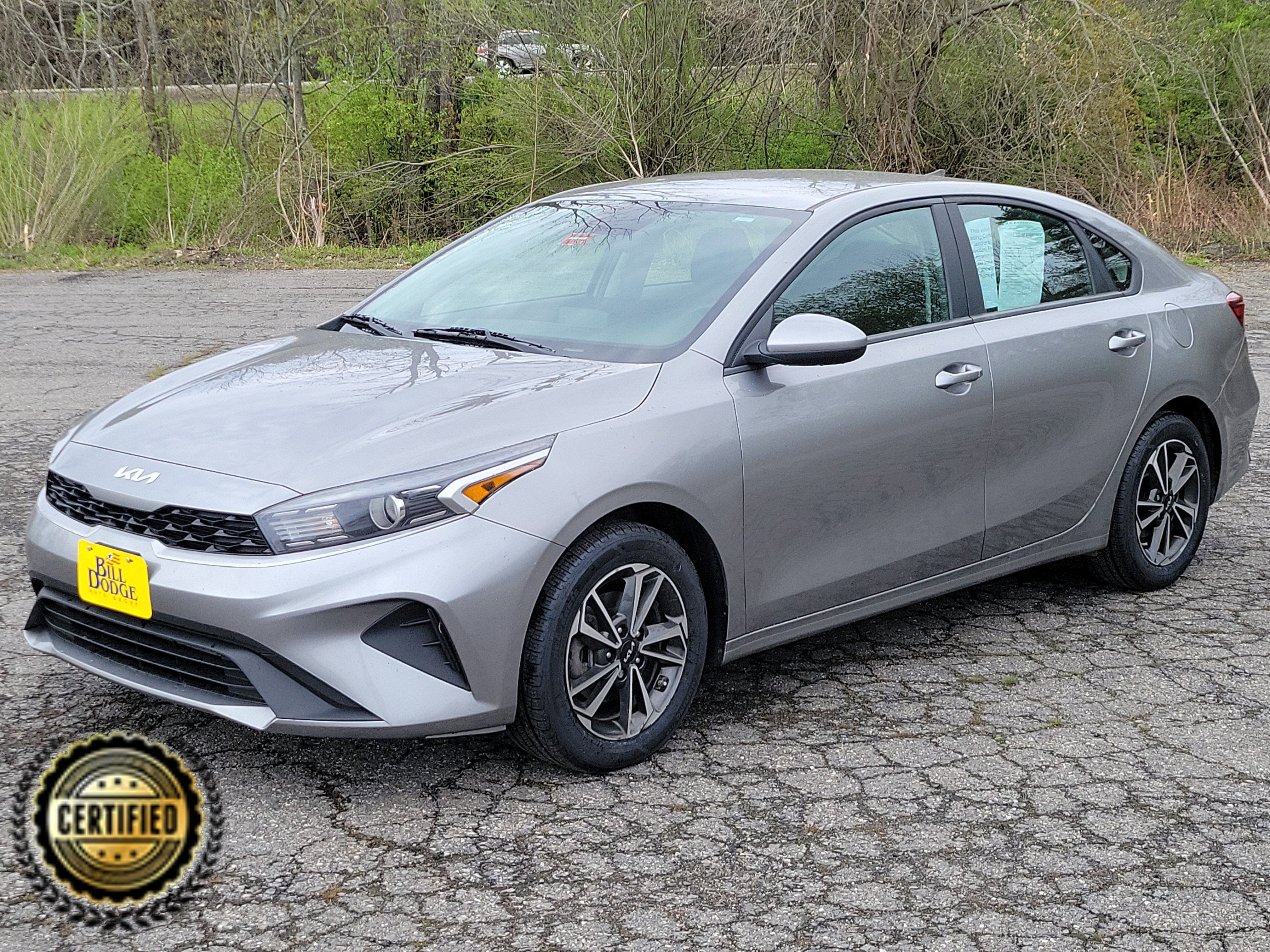 2023 Kia Forte LXS in Steel Gray — front three-quarter view