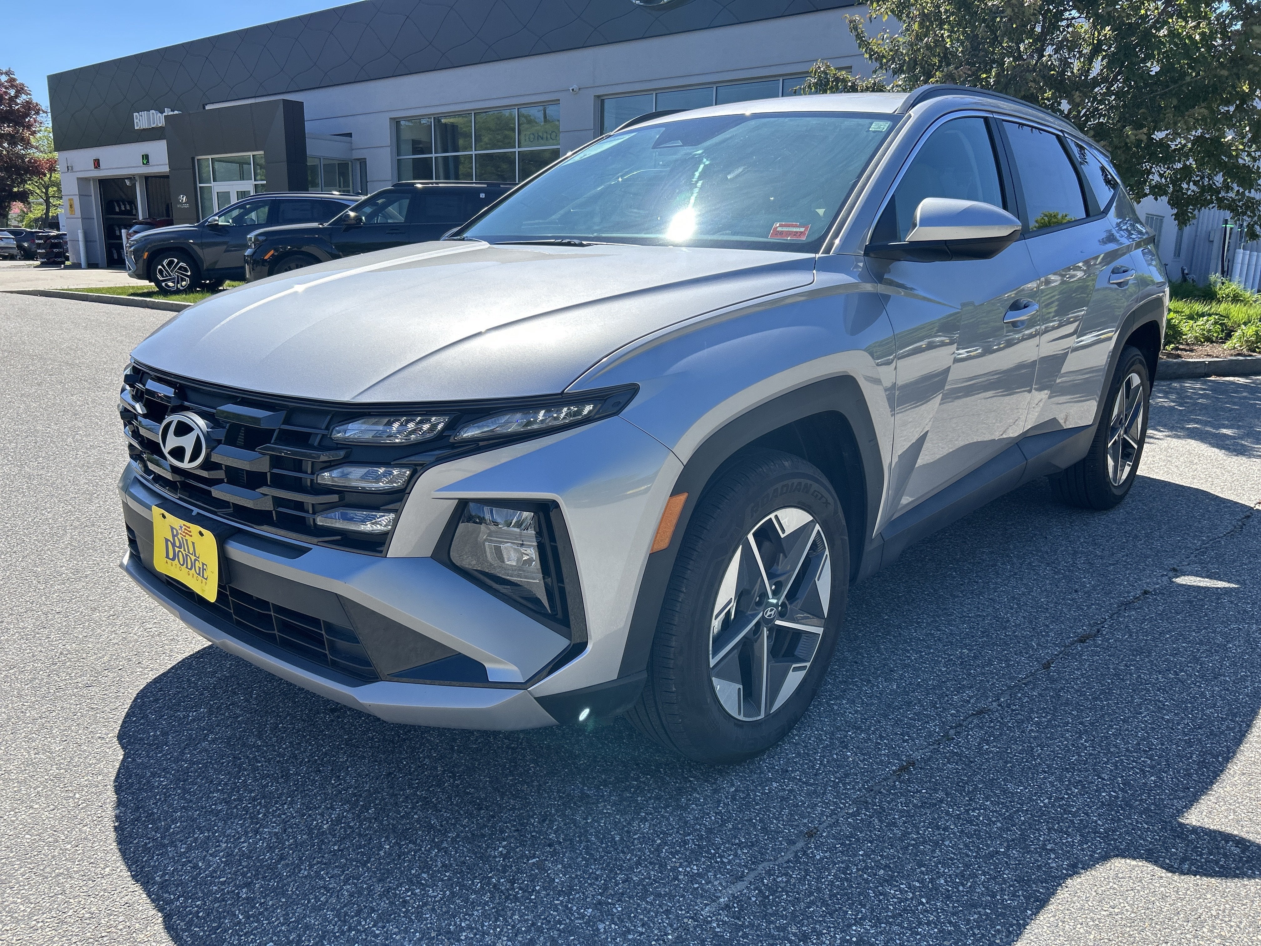 2026 Hyundai Tucson Hybrid SEL in Shimmering Silver — front three-quarter view