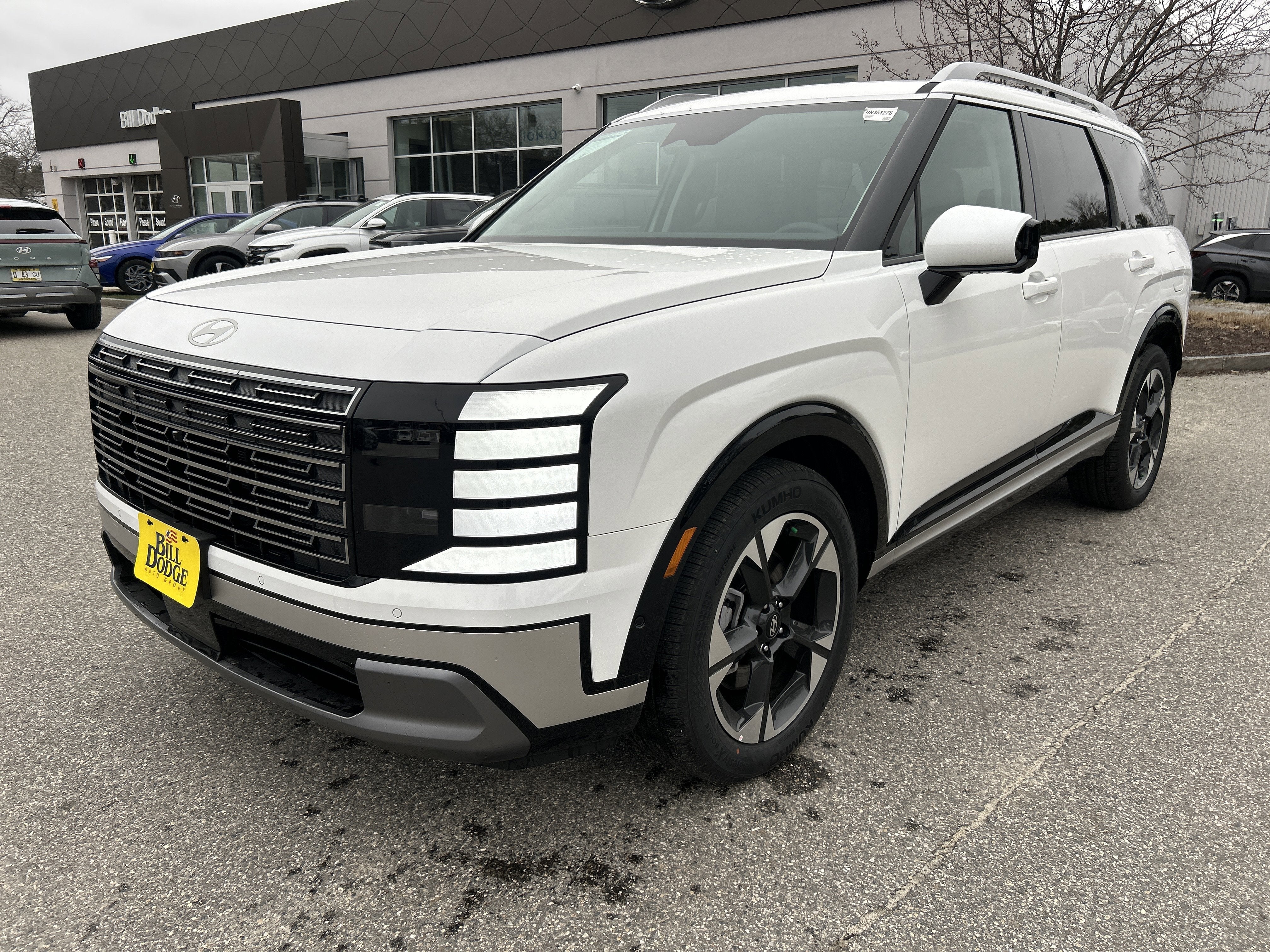 2026 Hyundai Palisade Limited in Creamy White Pearl — front three-quarter view
