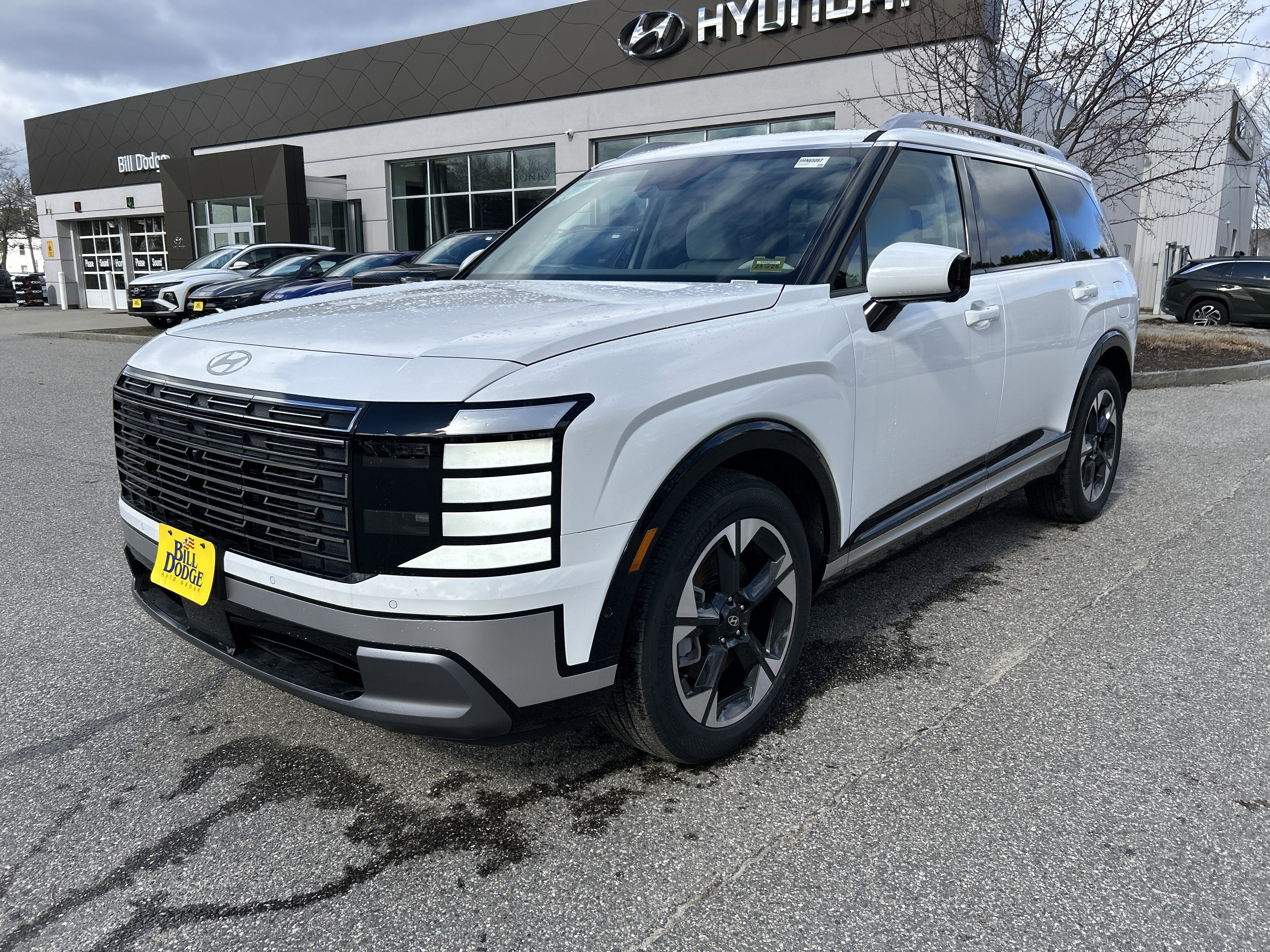 2026 Hyundai Palisade Limited in Creamy White Pearl — front three-quarter view