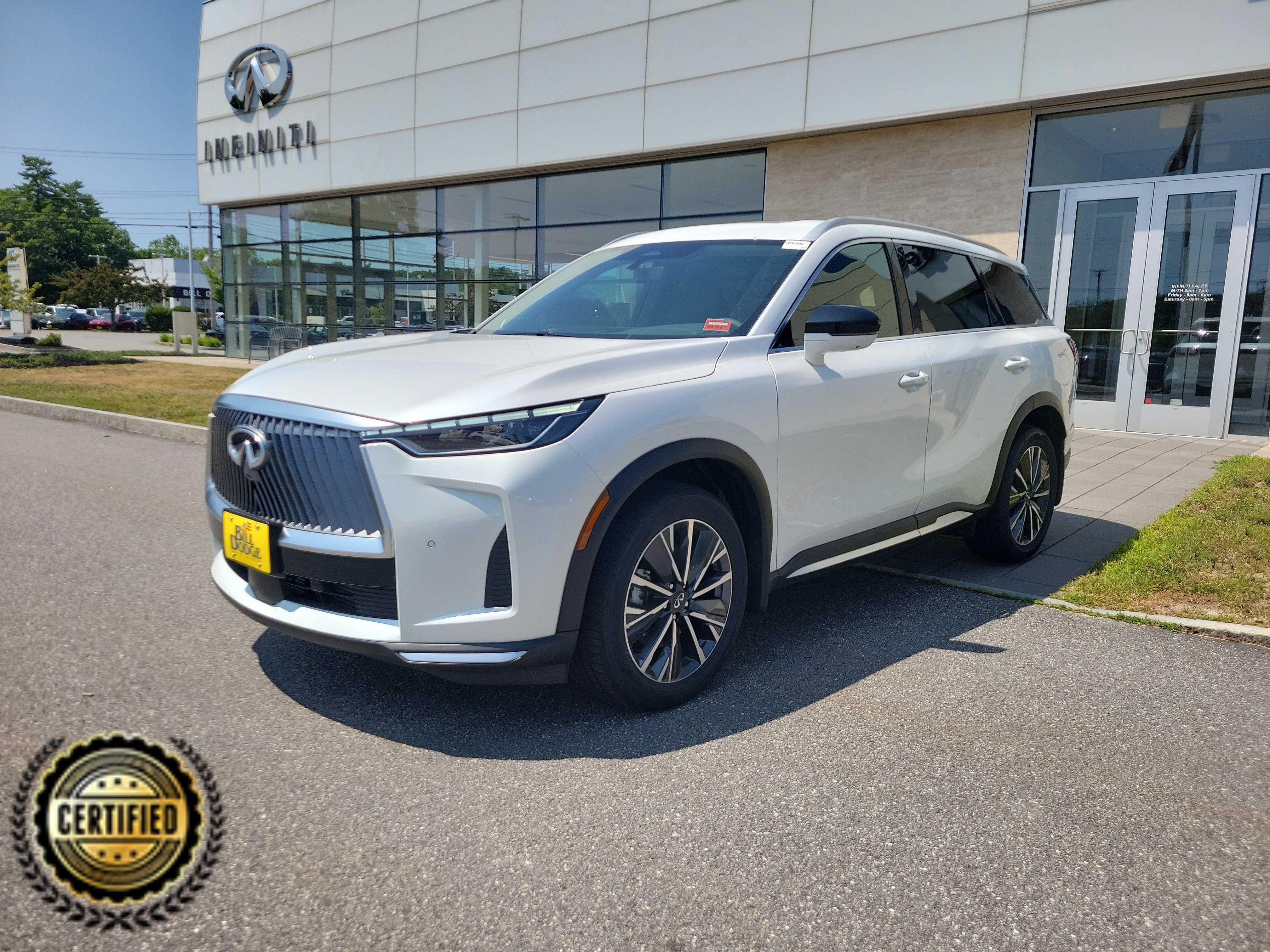 2026 INFINITI QX60 Luxe AWD in Radiant White — front three-quarter view