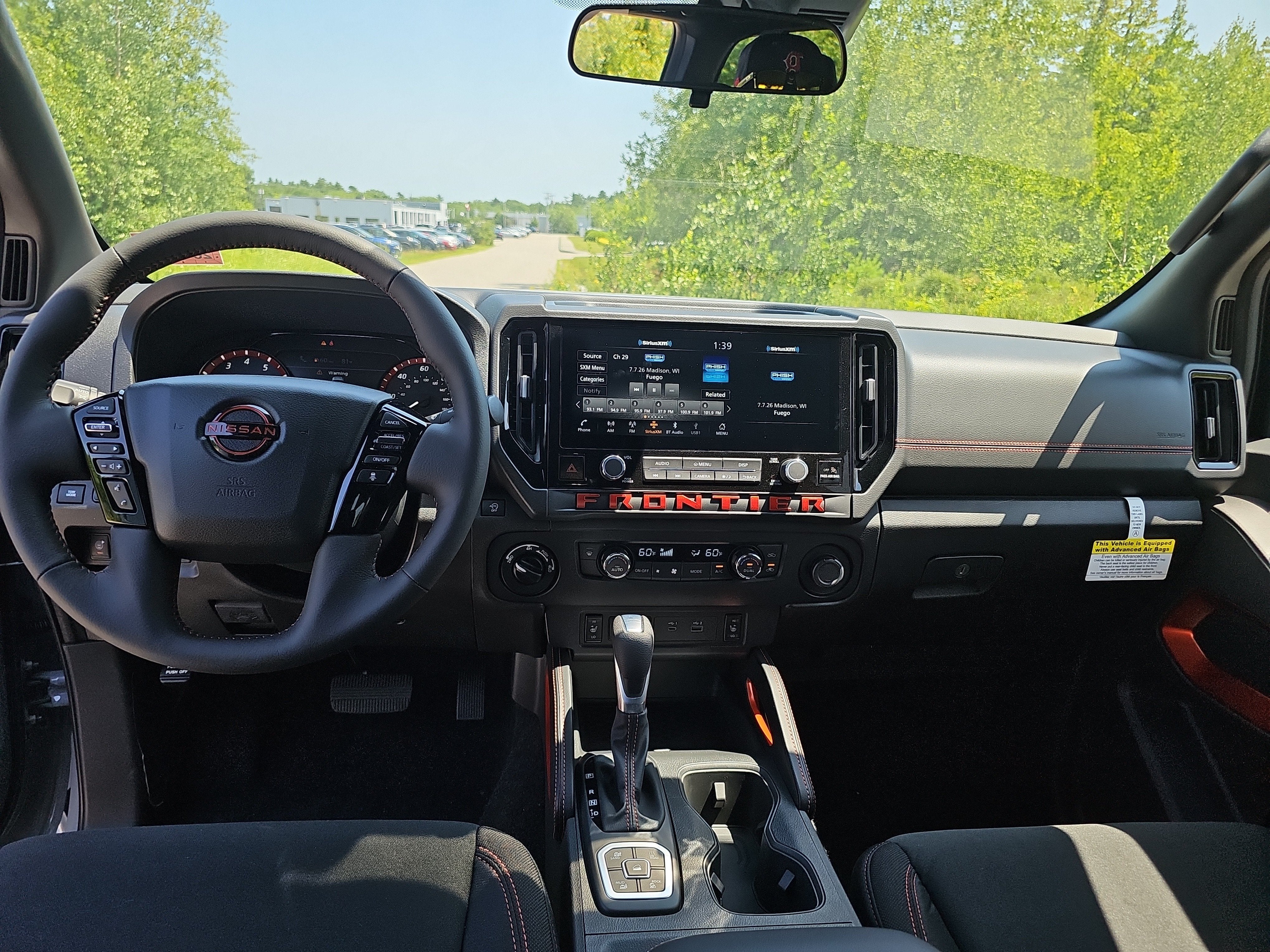2026 Nissan Frontier — rear three-quarter view
