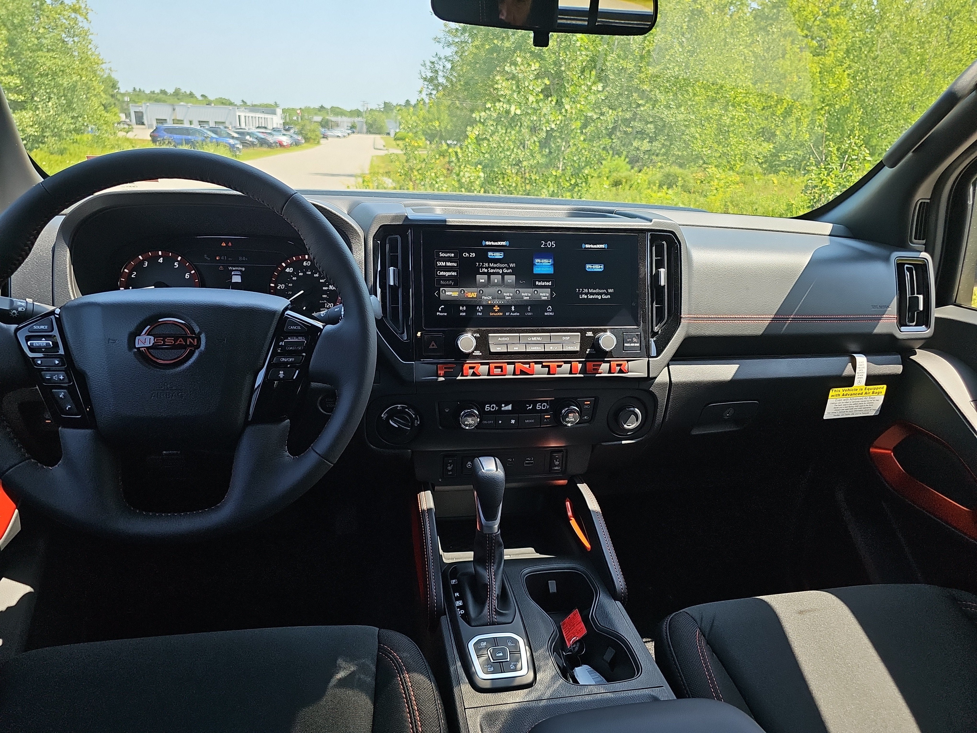 2026 Nissan Frontier — rear three-quarter view