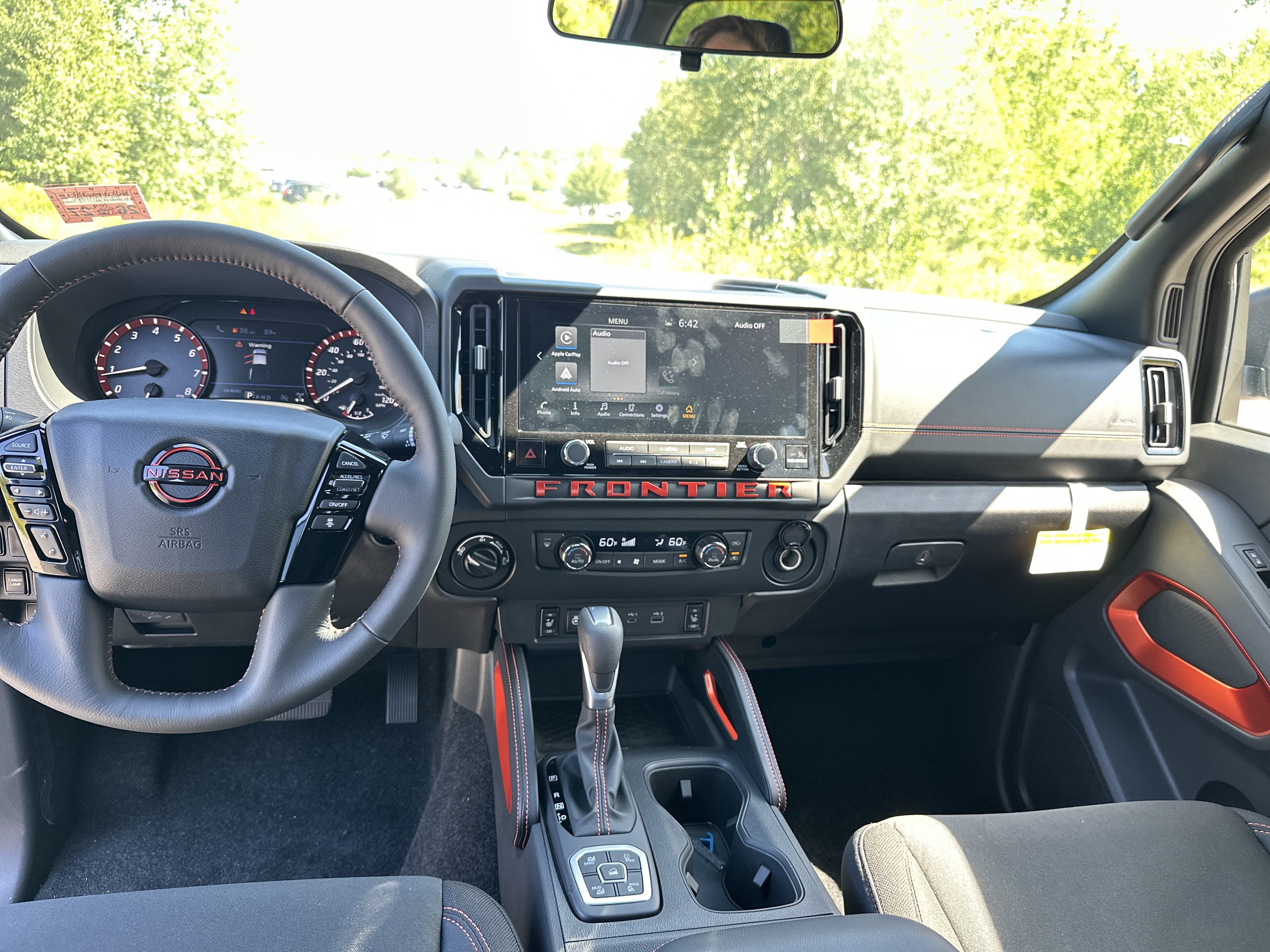 2026 Nissan Frontier — rear three-quarter view