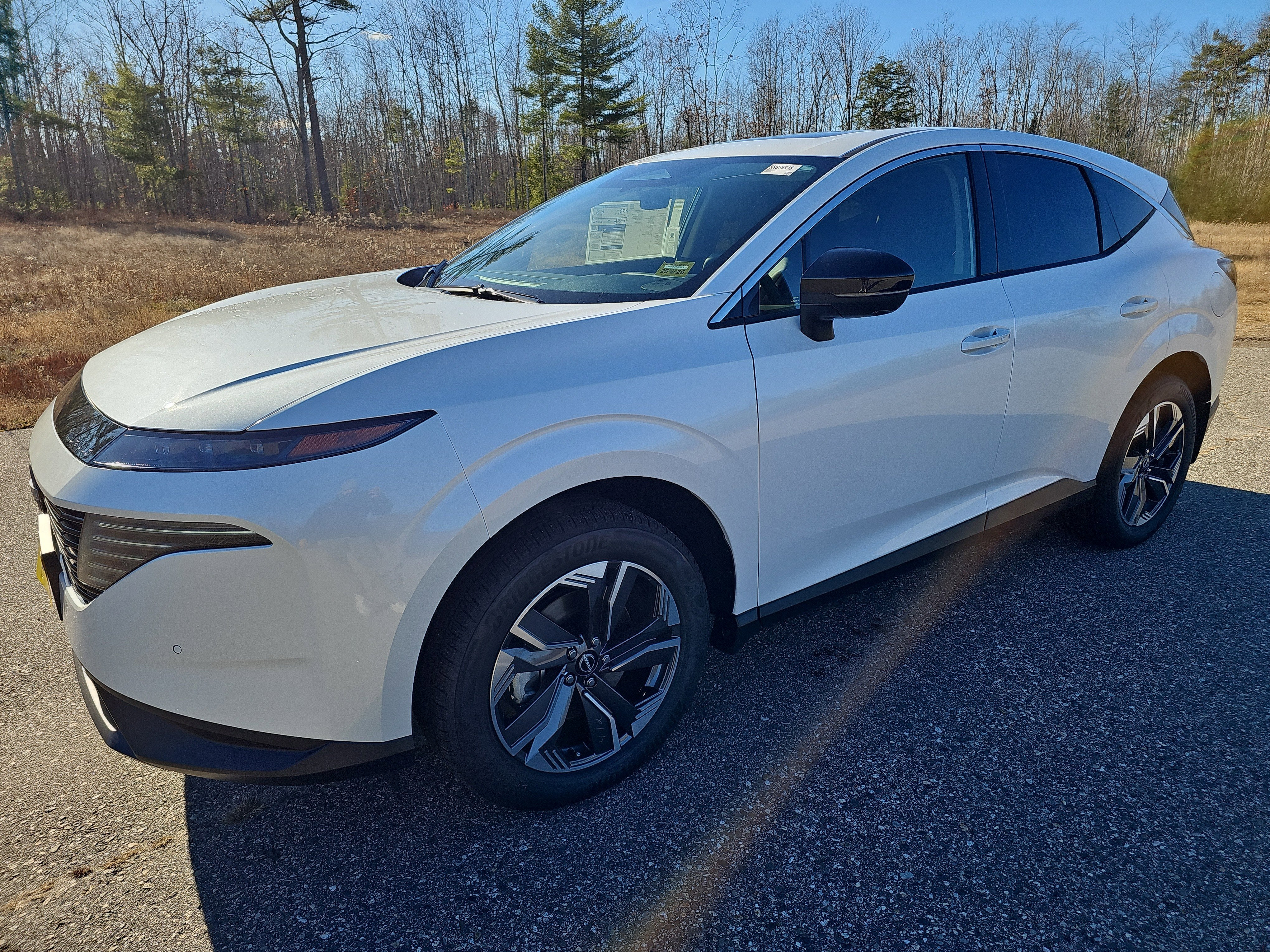 2026 Nissan Murano SL in Everest White Pearl Tricoat — front three-quarter view