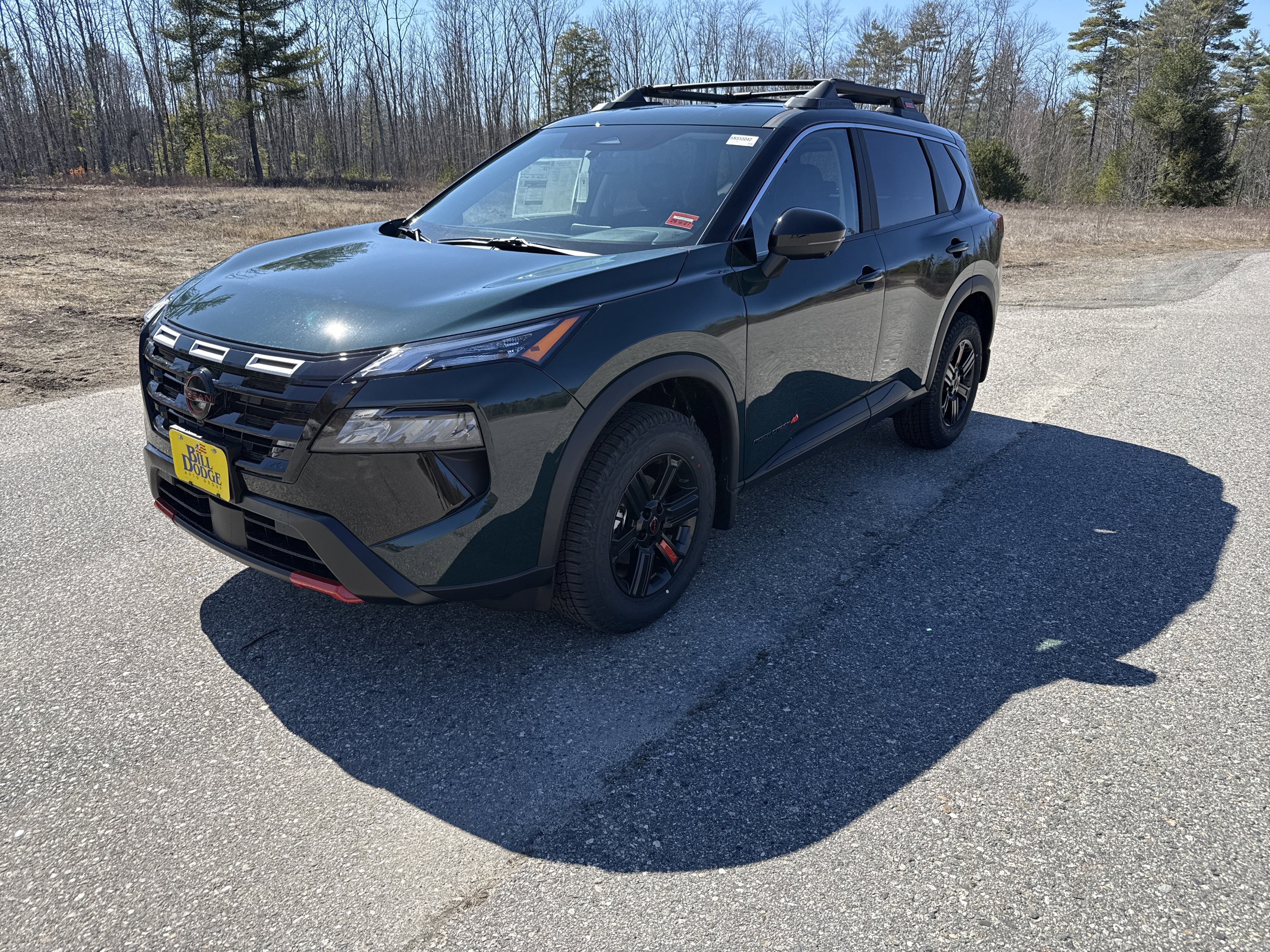 2026 Nissan Rogue Rock Creek in Obsidian Green — front three-quarter view