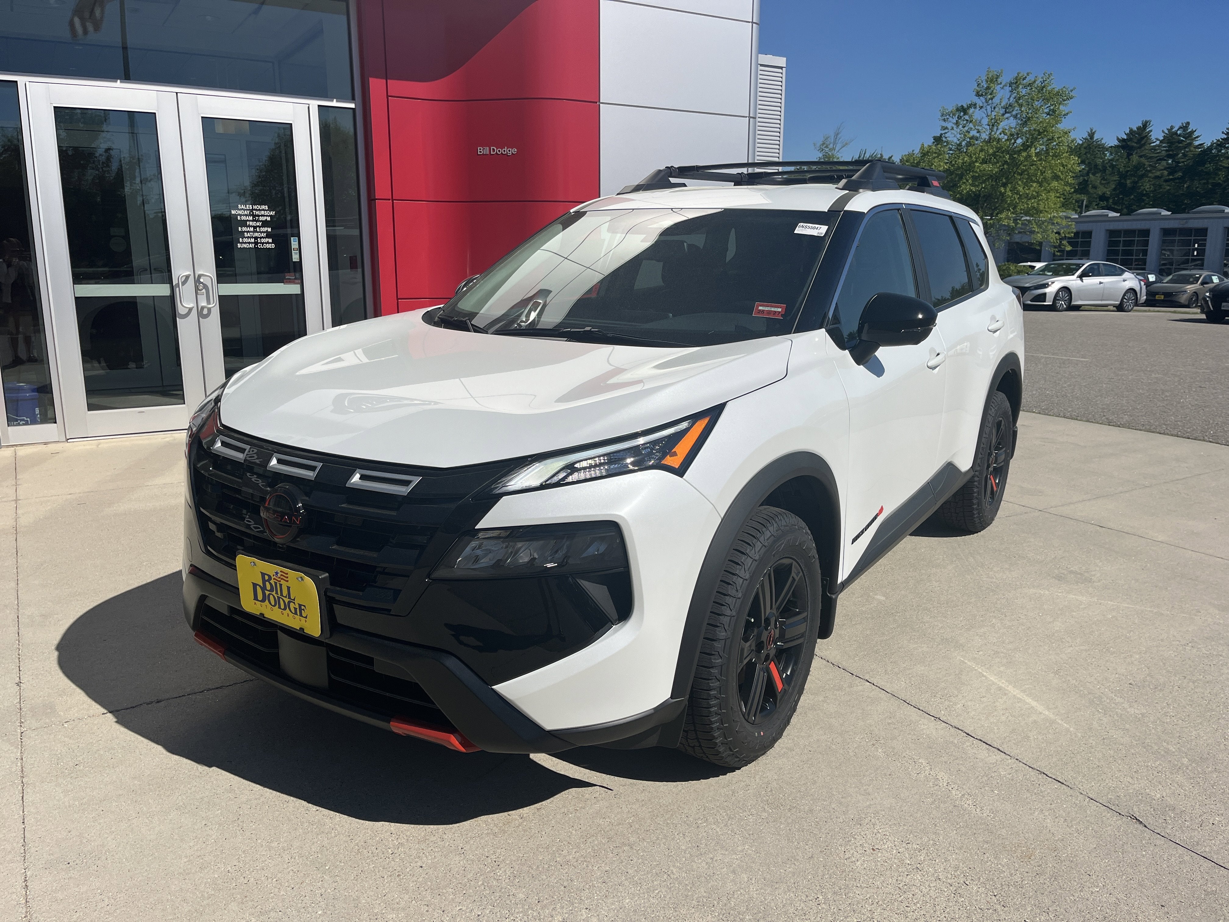 2026 Nissan Rogue Rock Creek in Everest White Pearl Tricoat — front three-quarter view