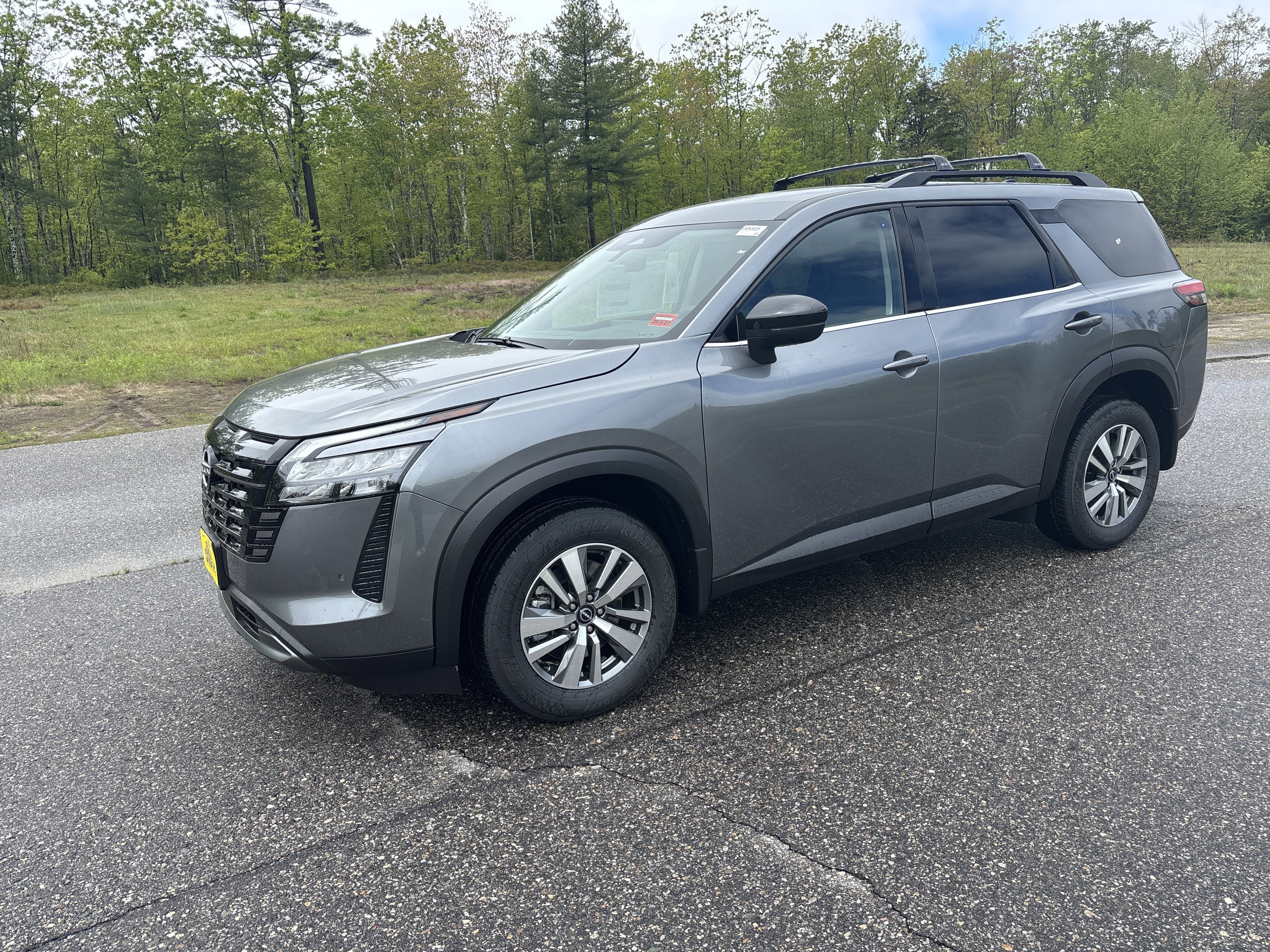 2026 Nissan Pathfinder SL in Gun Metallic — front three-quarter view