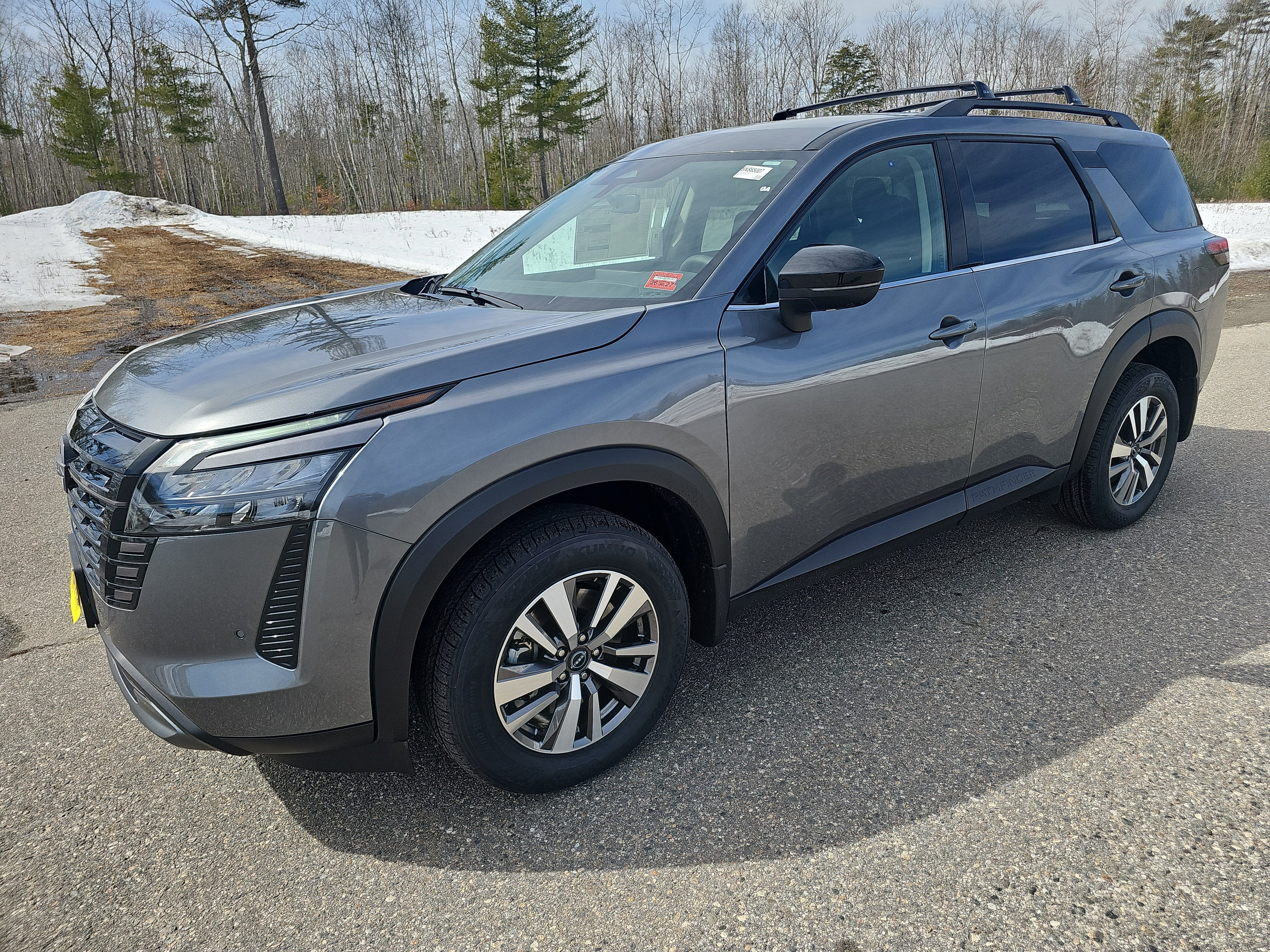 2026 Nissan Pathfinder SL in Gun Metallic — front three-quarter view