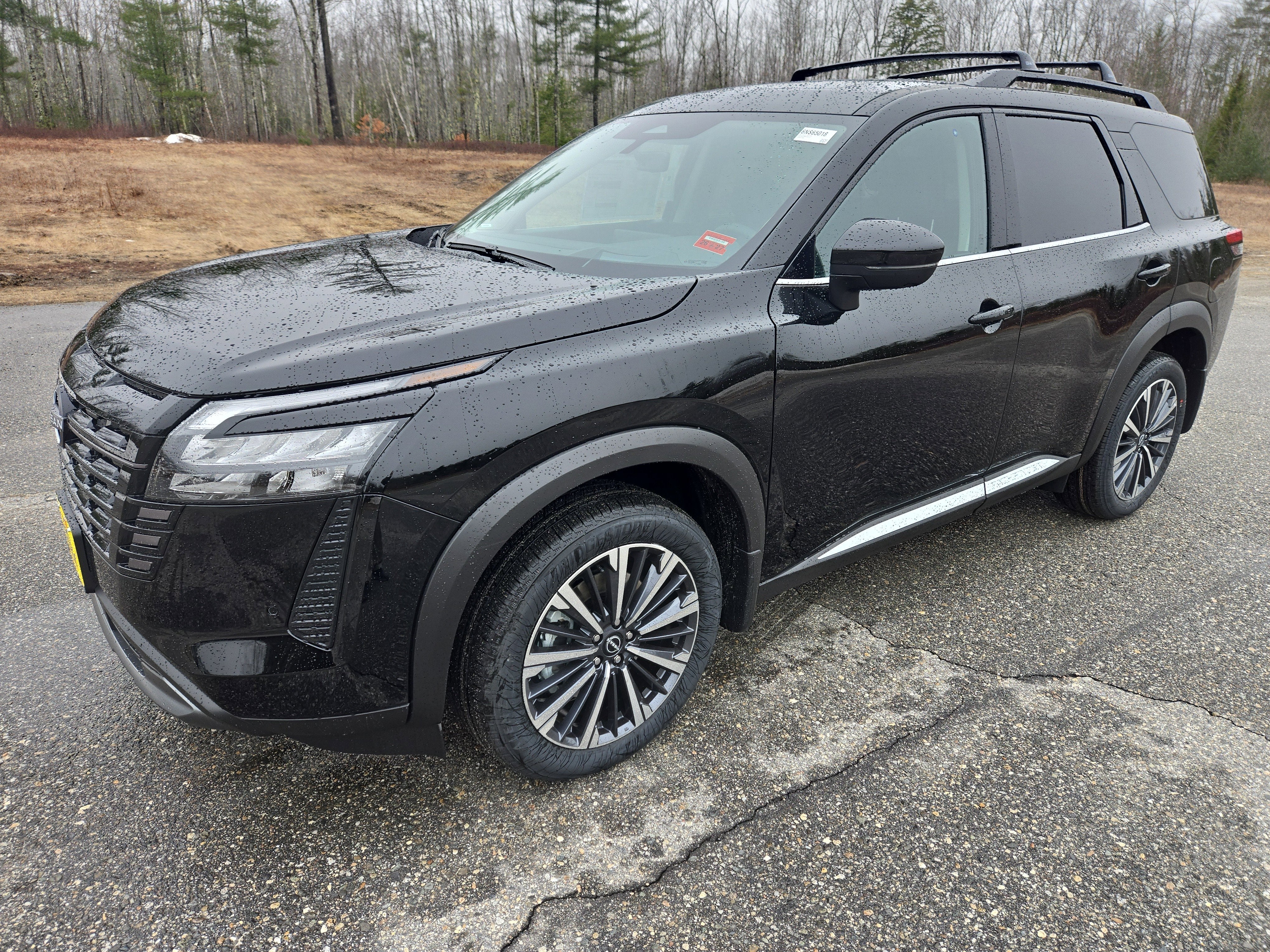 2026 Nissan Pathfinder Platinum in Super Black — front three-quarter view