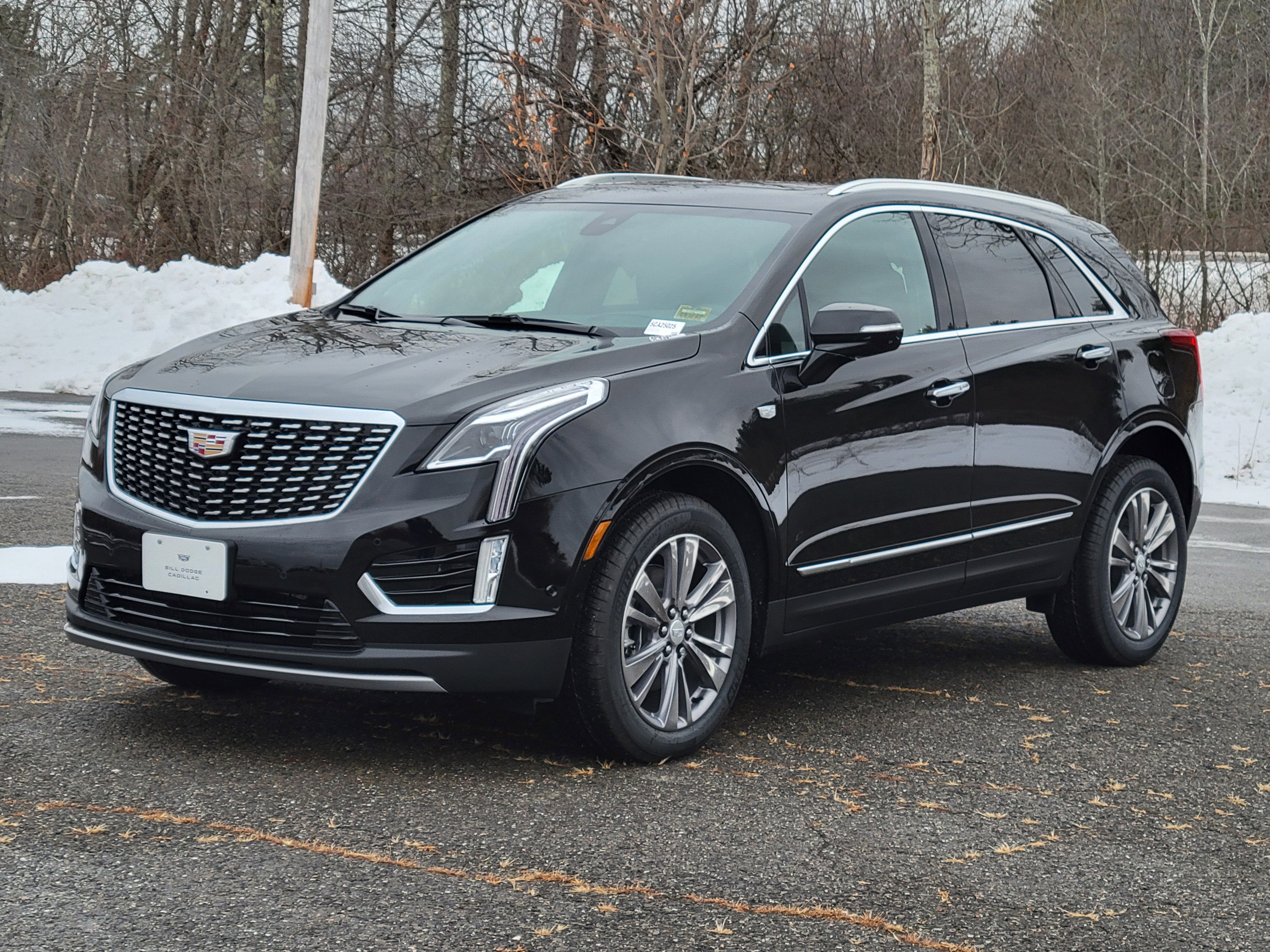 2026 Cadillac XT5 Premium Luxury in Stellar Black Metallic — front three-quarter view