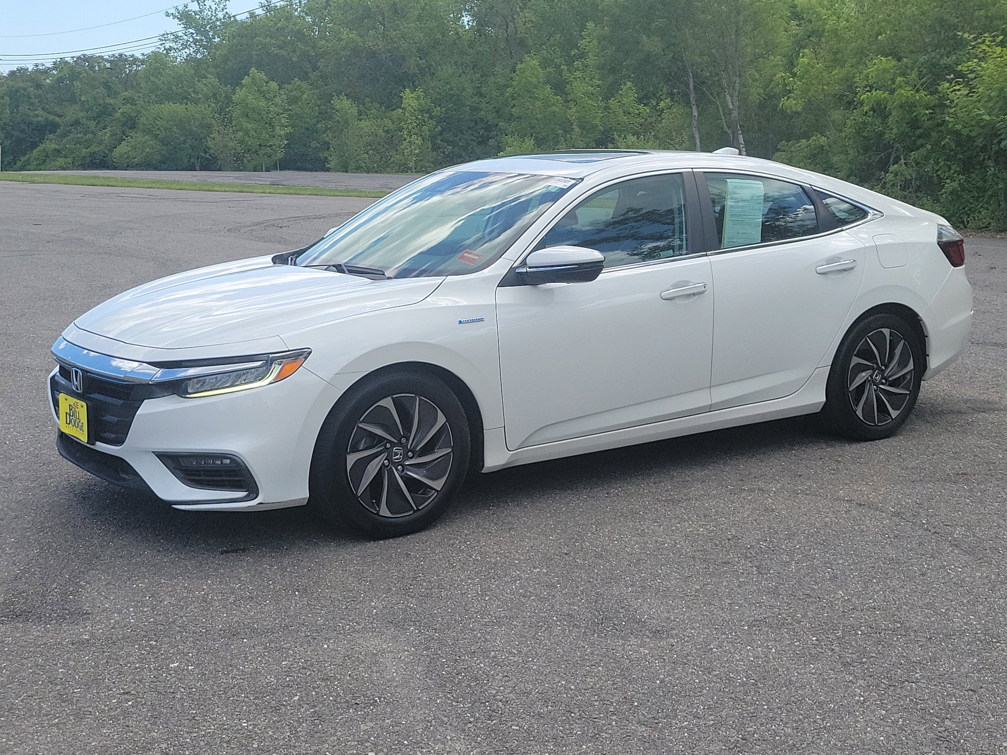 2021 Honda Insight Touring in White — front three-quarter view