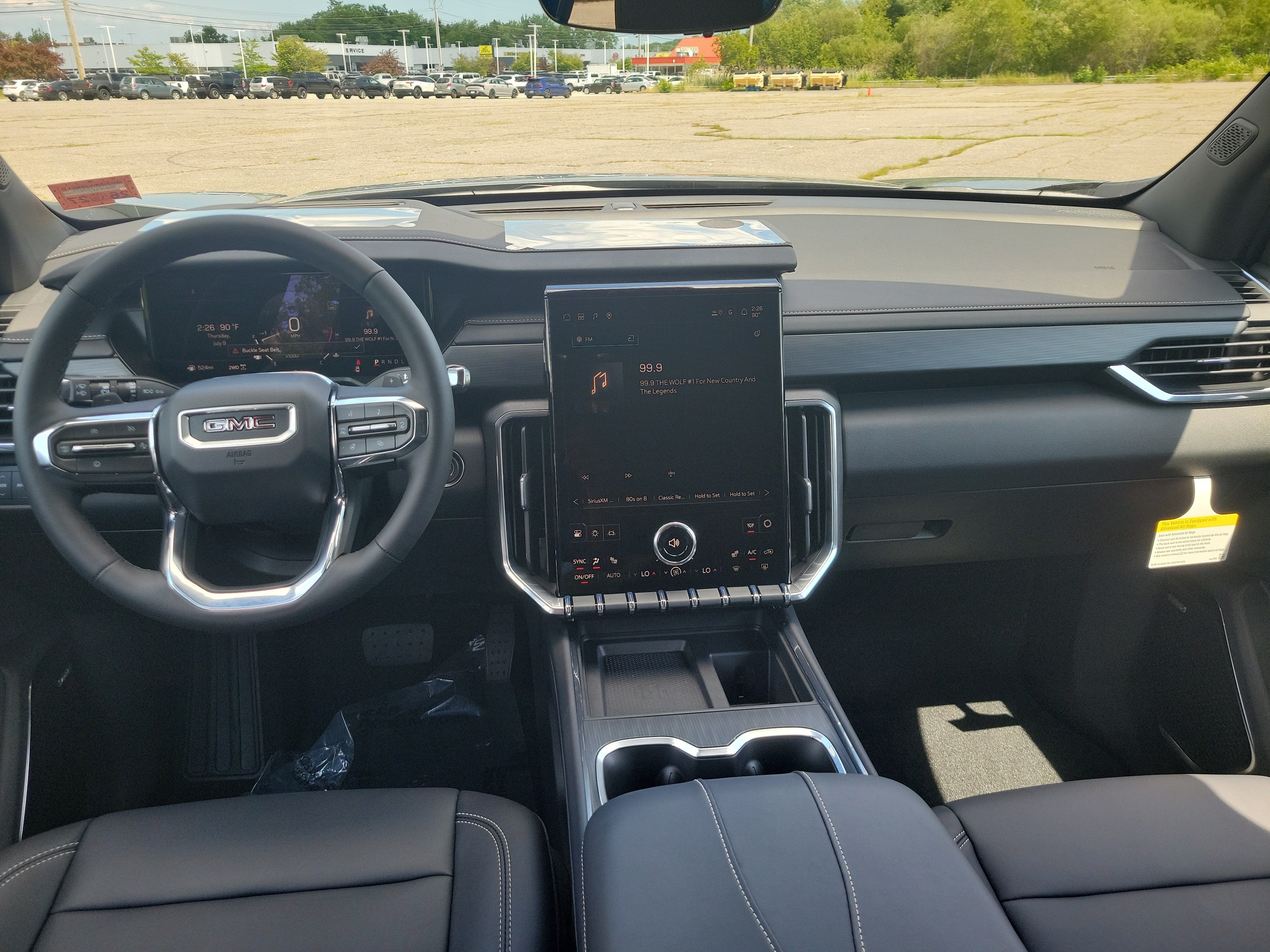 2026 GMC Acadia — rear three-quarter view