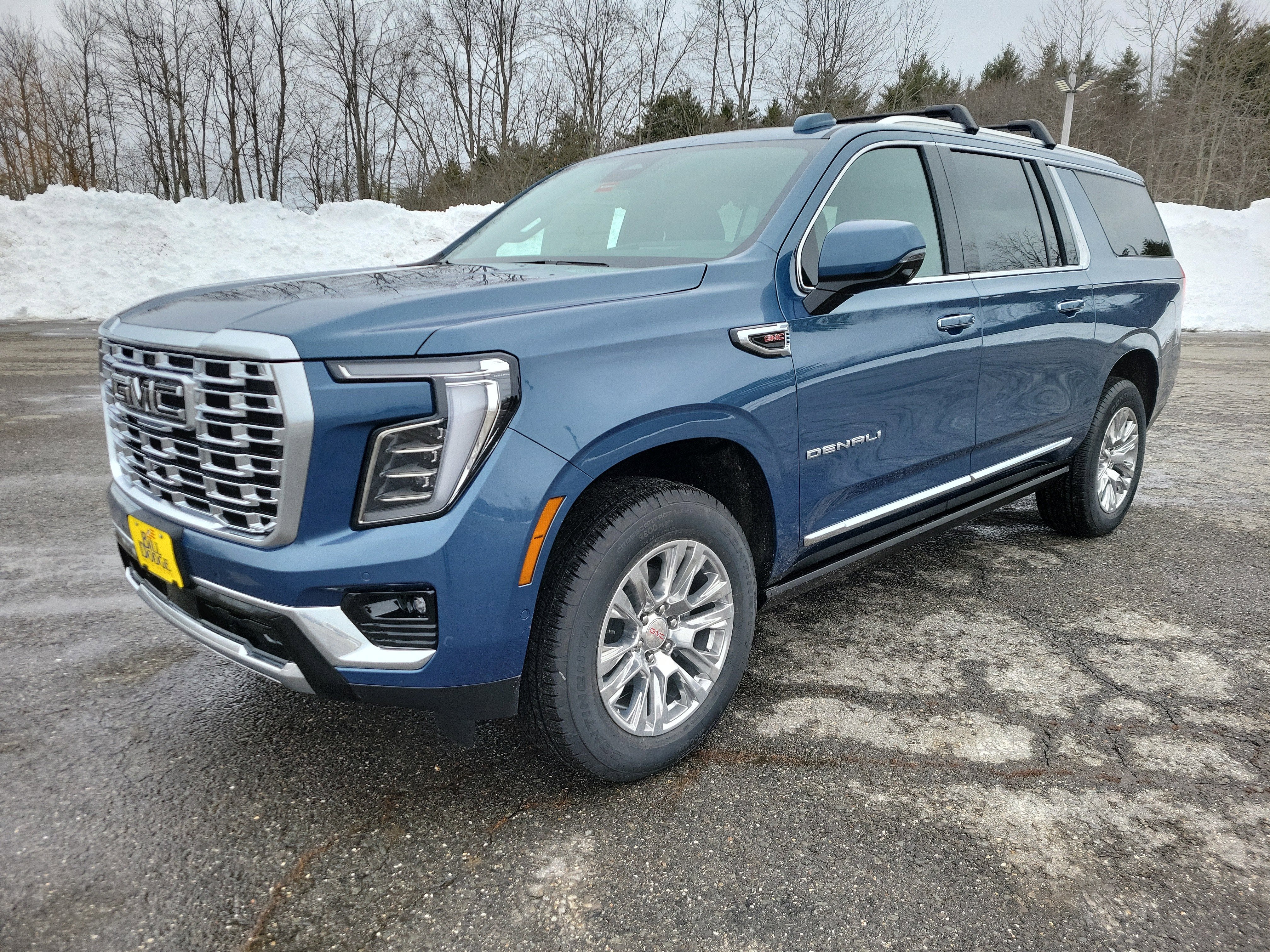 2026 GMC Yukon XL Denali in Downpour Metallic — front three-quarter view