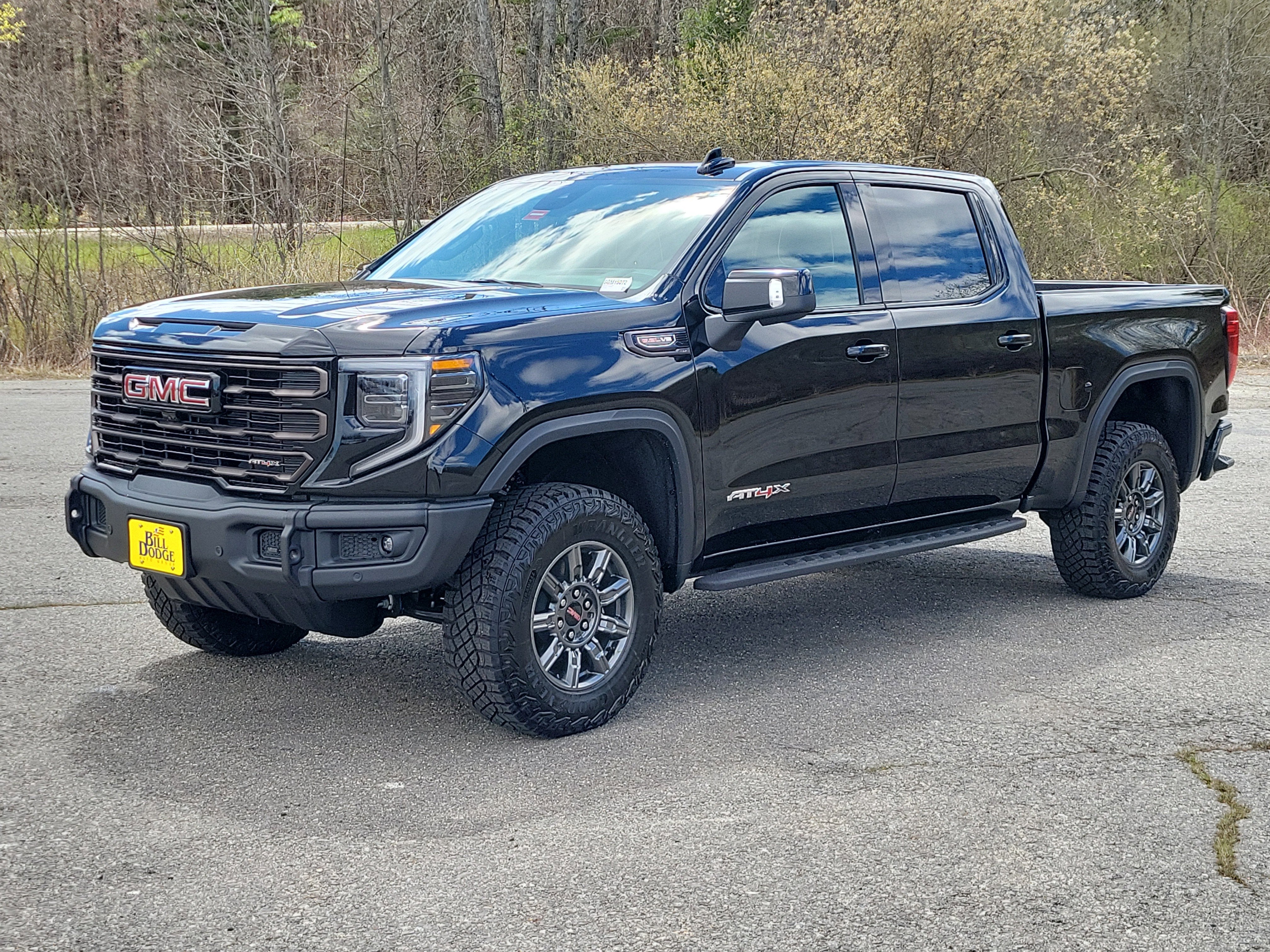 2026 GMC Sierra 1500 AT4X in Onyx Black — front three-quarter view