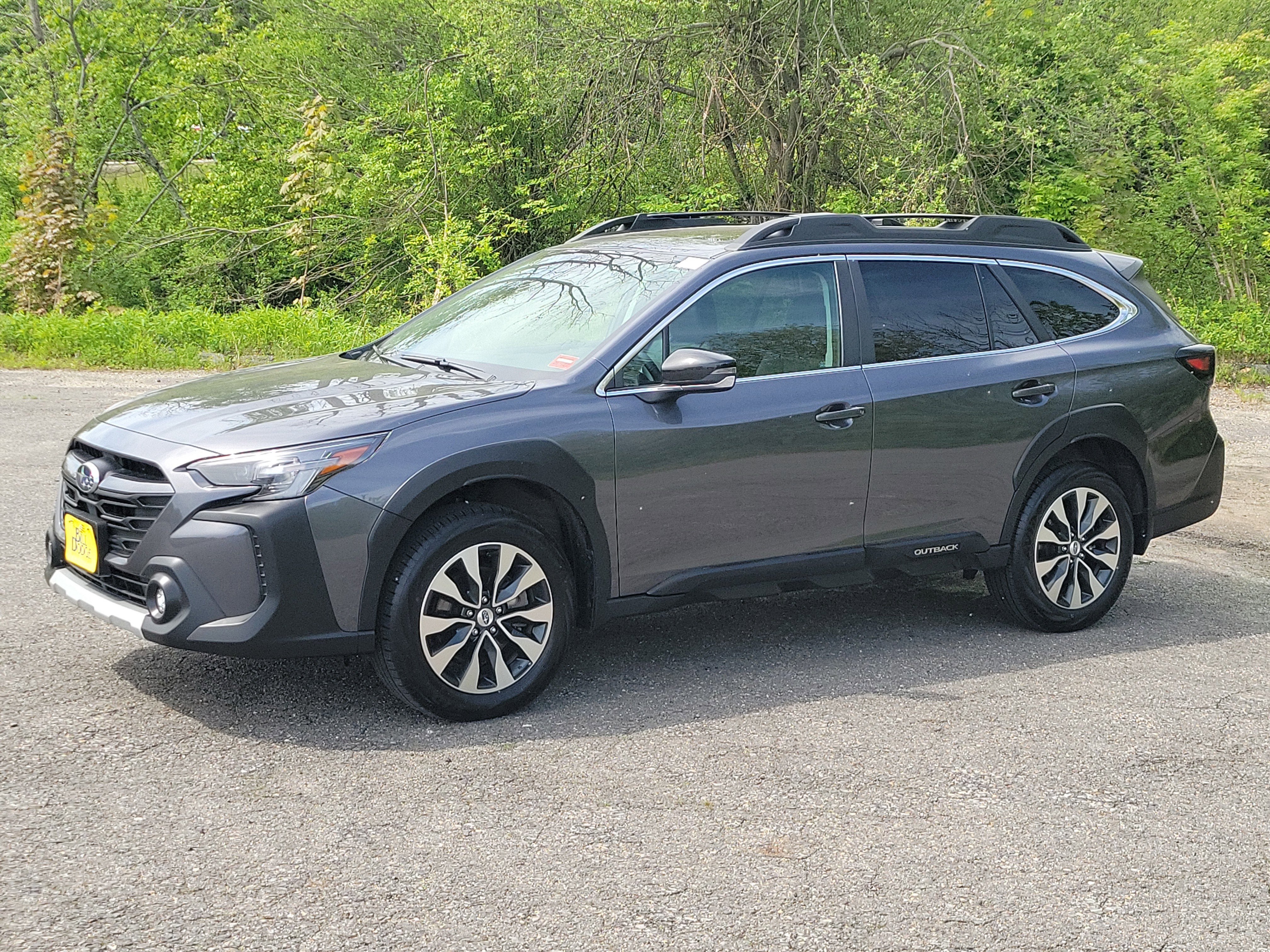 2025 Subaru Outback Limited XT in Gray — front three-quarter view