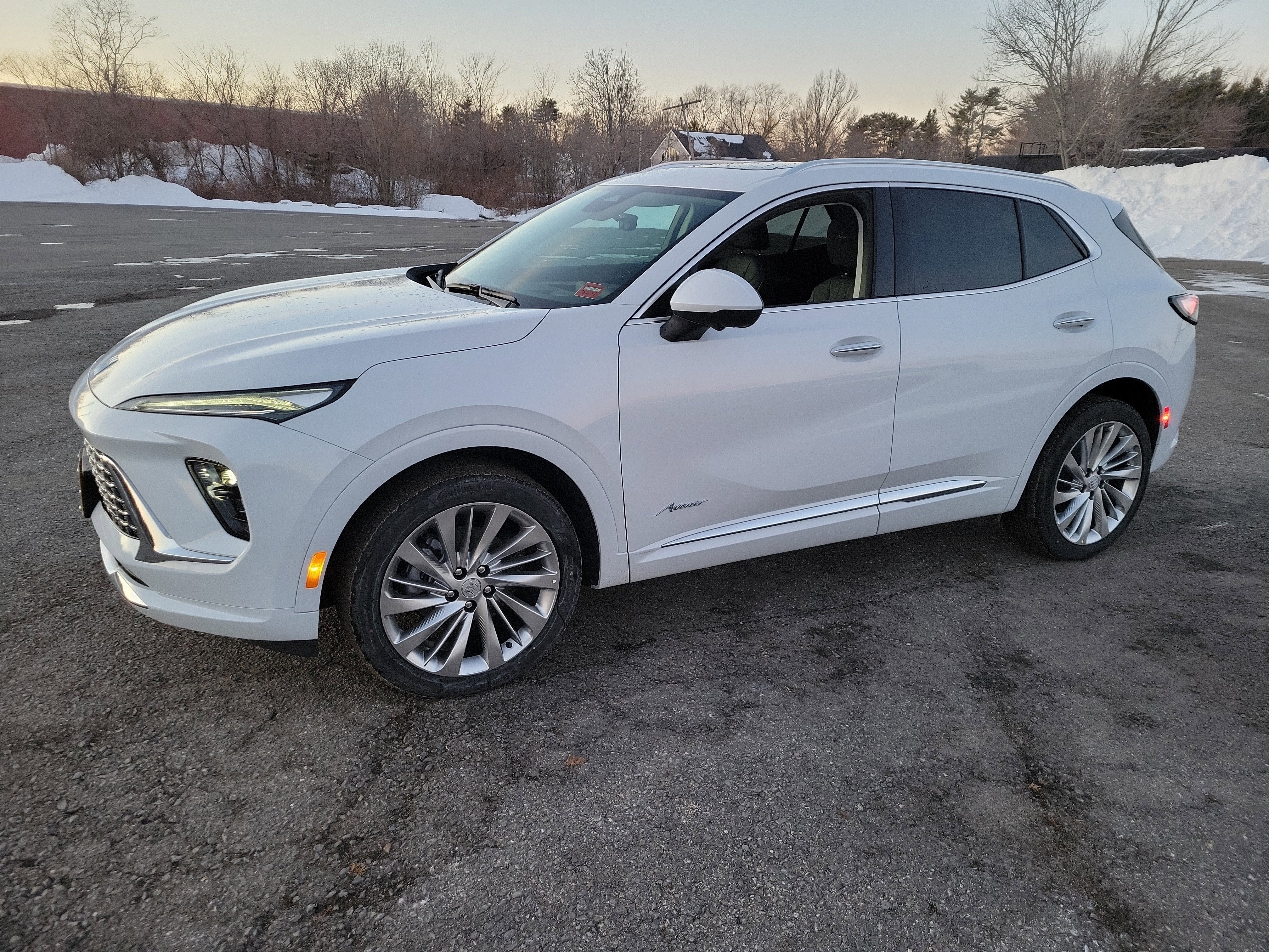 2026 Buick Envision Avenir in Iridescent White Tricoat — front three-quarter view