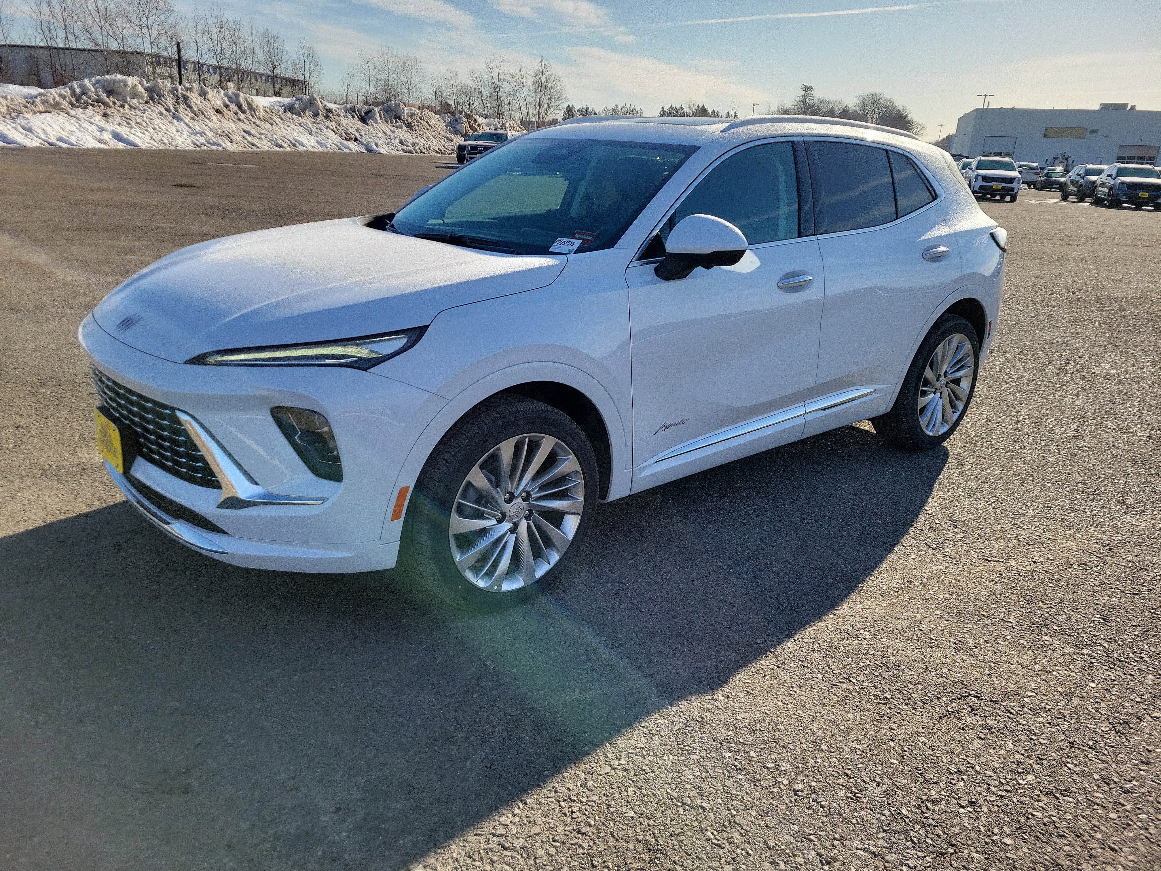 2026 Buick Envision Avenir in Iridescent White Tricoat — front three-quarter view