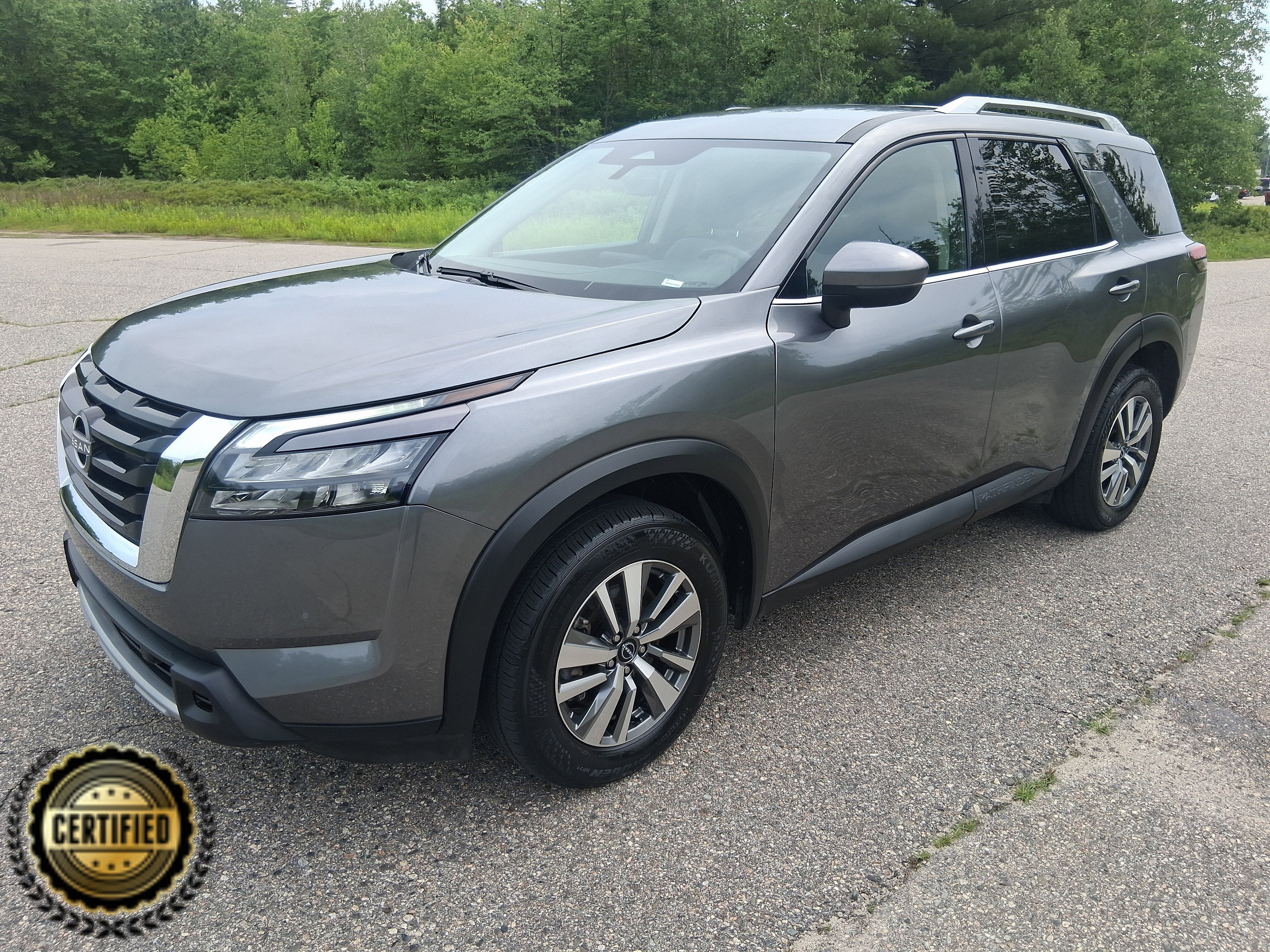 2025 Nissan Pathfinder SL in Gun Metallic — front three-quarter view
