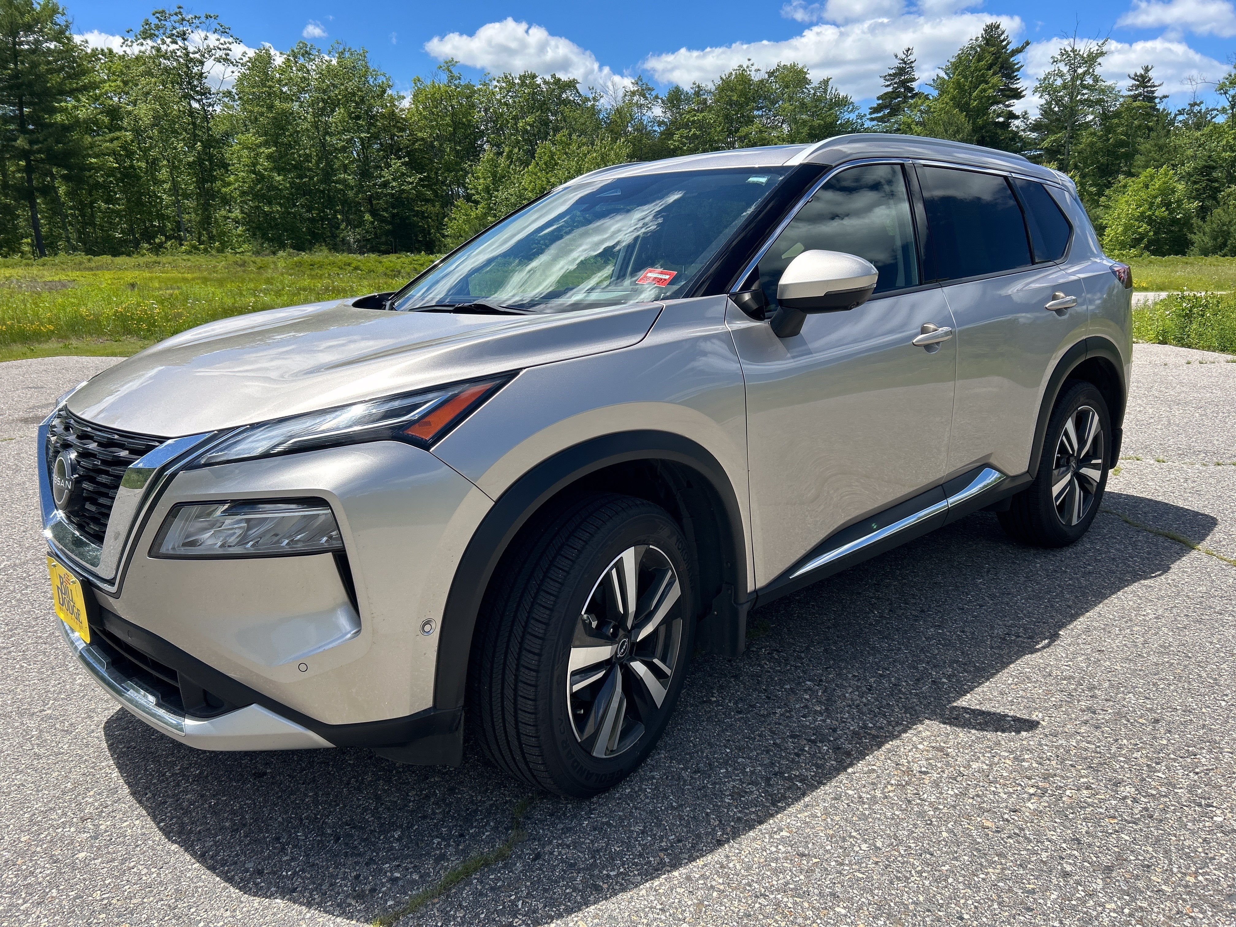 2023 Nissan Rogue Platinum in Champagne Silver Metallic — front three-quarter view