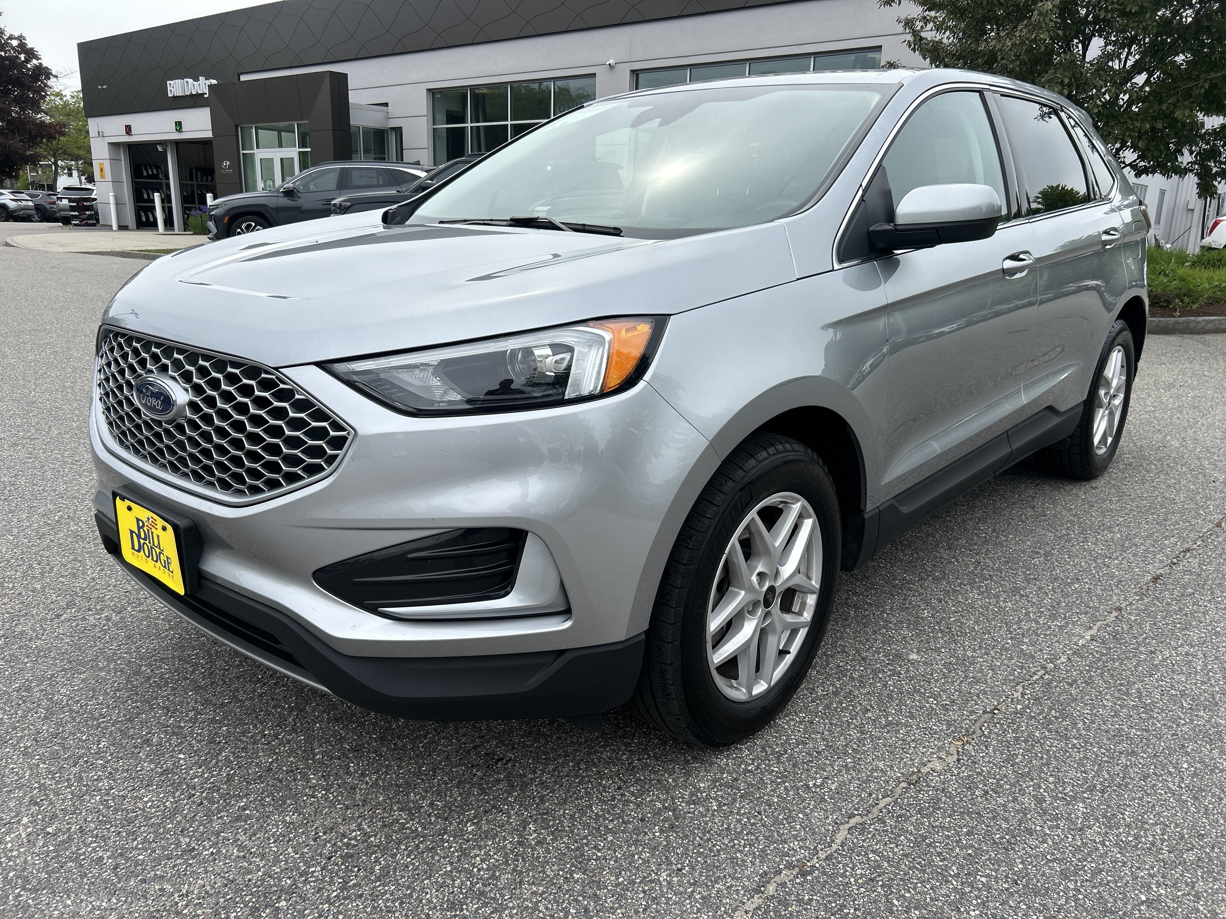 2024 Ford Edge SEL in Iconic Silver Metallic — front three-quarter view
