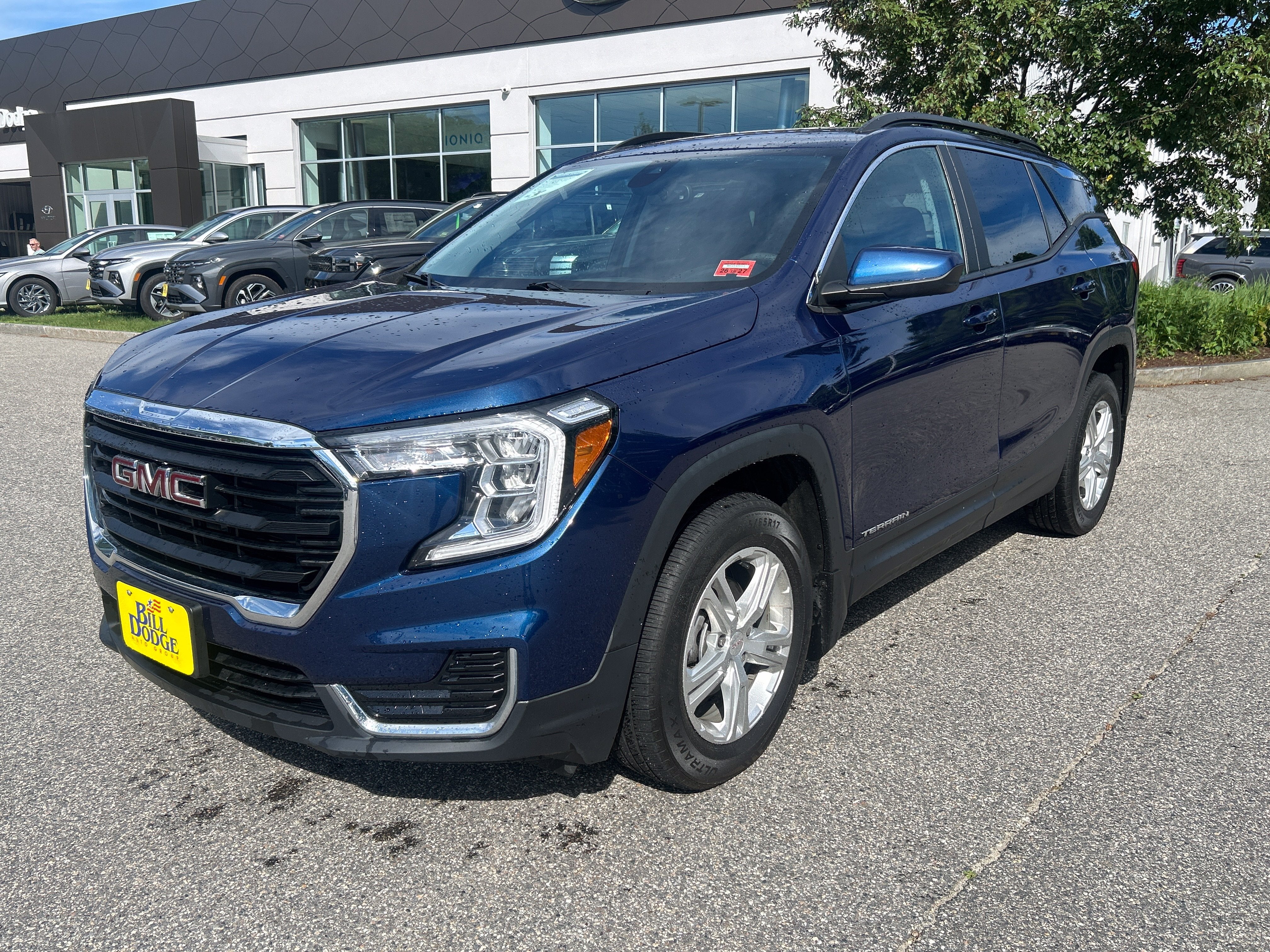 2022 GMC Terrain SLE in Marine Metallic — front three-quarter view